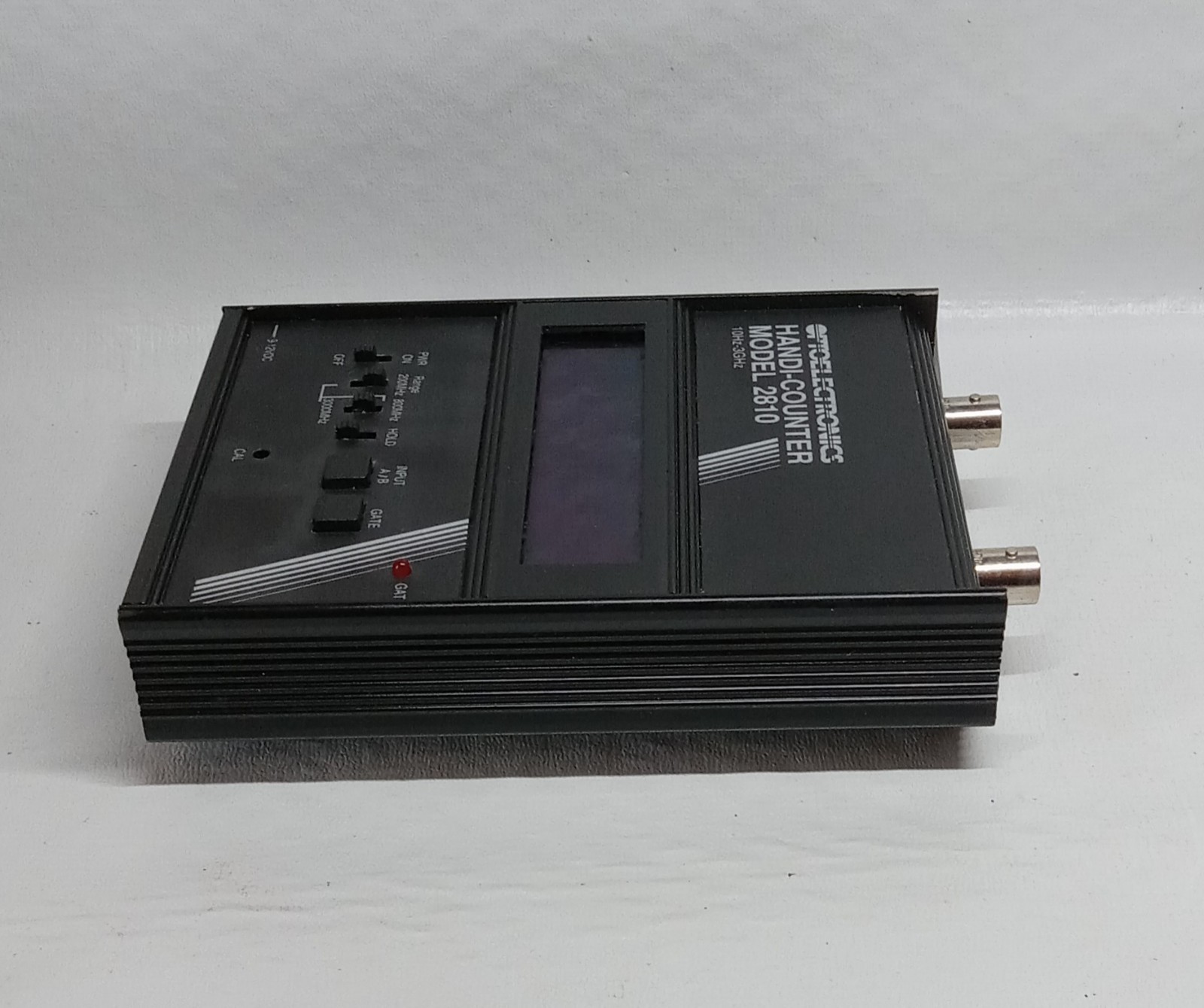 Optoelectronics Handi-Counter Model 2810 Portable Frequency Counter with Manual