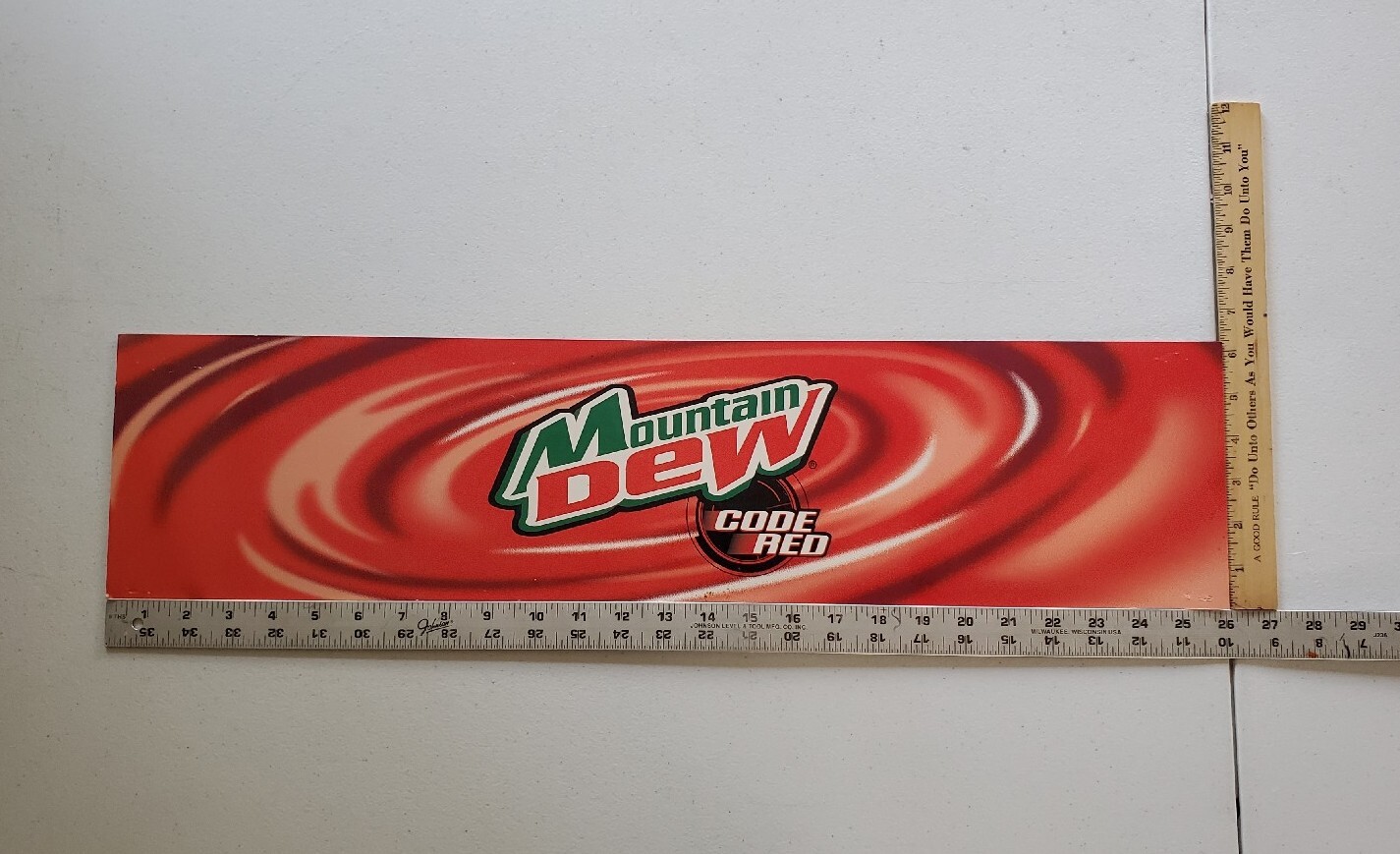 Vintage Mountain Dew Code Red Laminated Cardstock Advertisement 26"x6¼" Mtn Dew