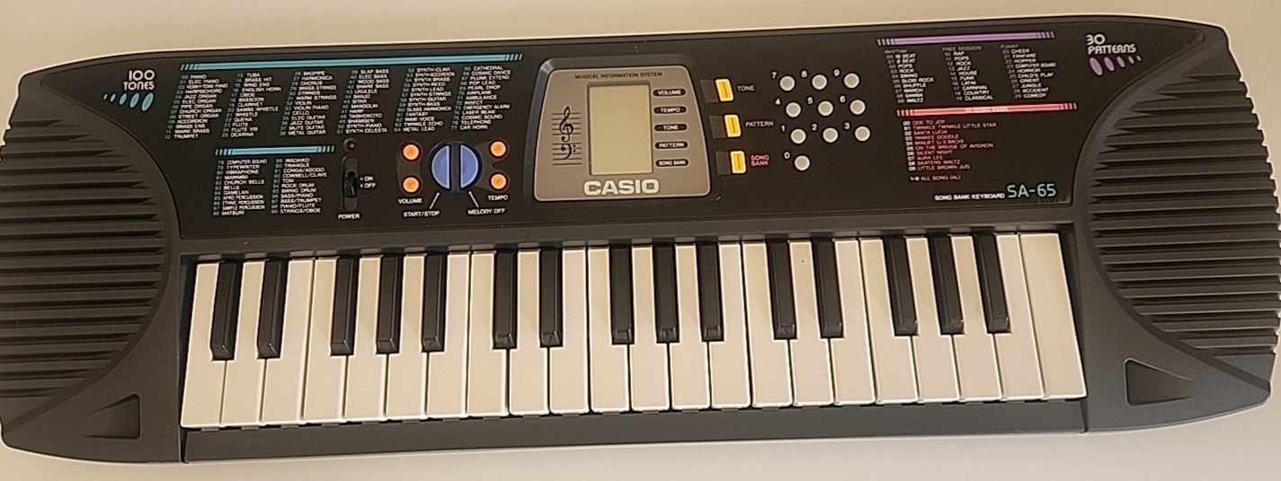 Vintage CASIO SA-65 keyboard Multi Option Song Bank Portable Keyboard TESTED