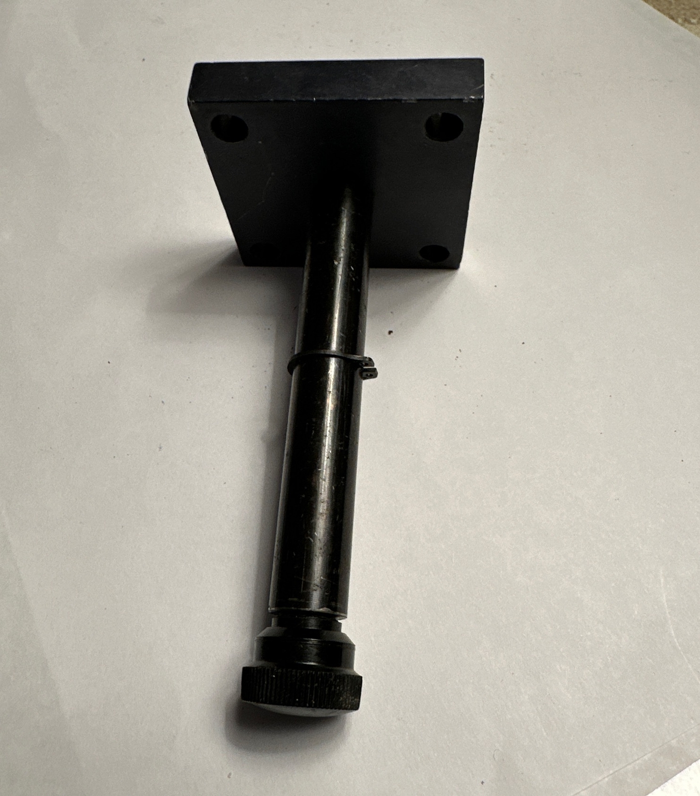 A 1/2” 35mm Film Roller Shaft With 2”x2” Mounting Bracket
