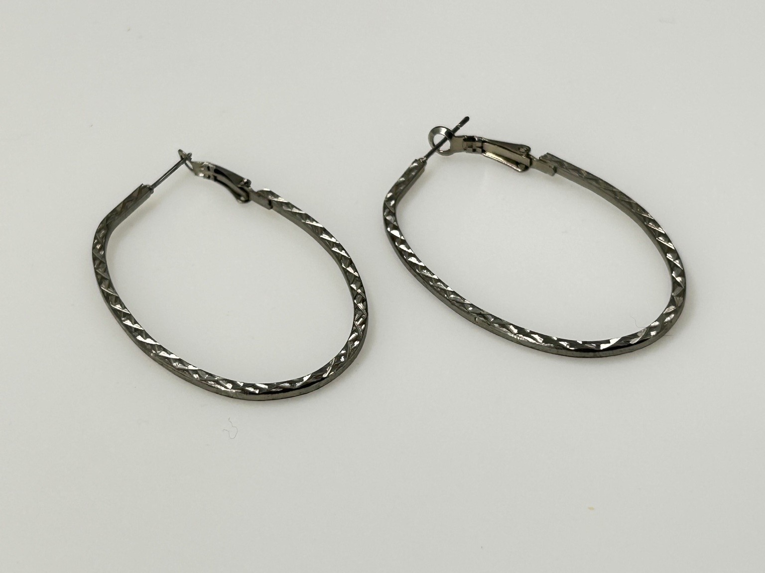 Silver Tone Textured Oval Hoop Earrings Lightweight