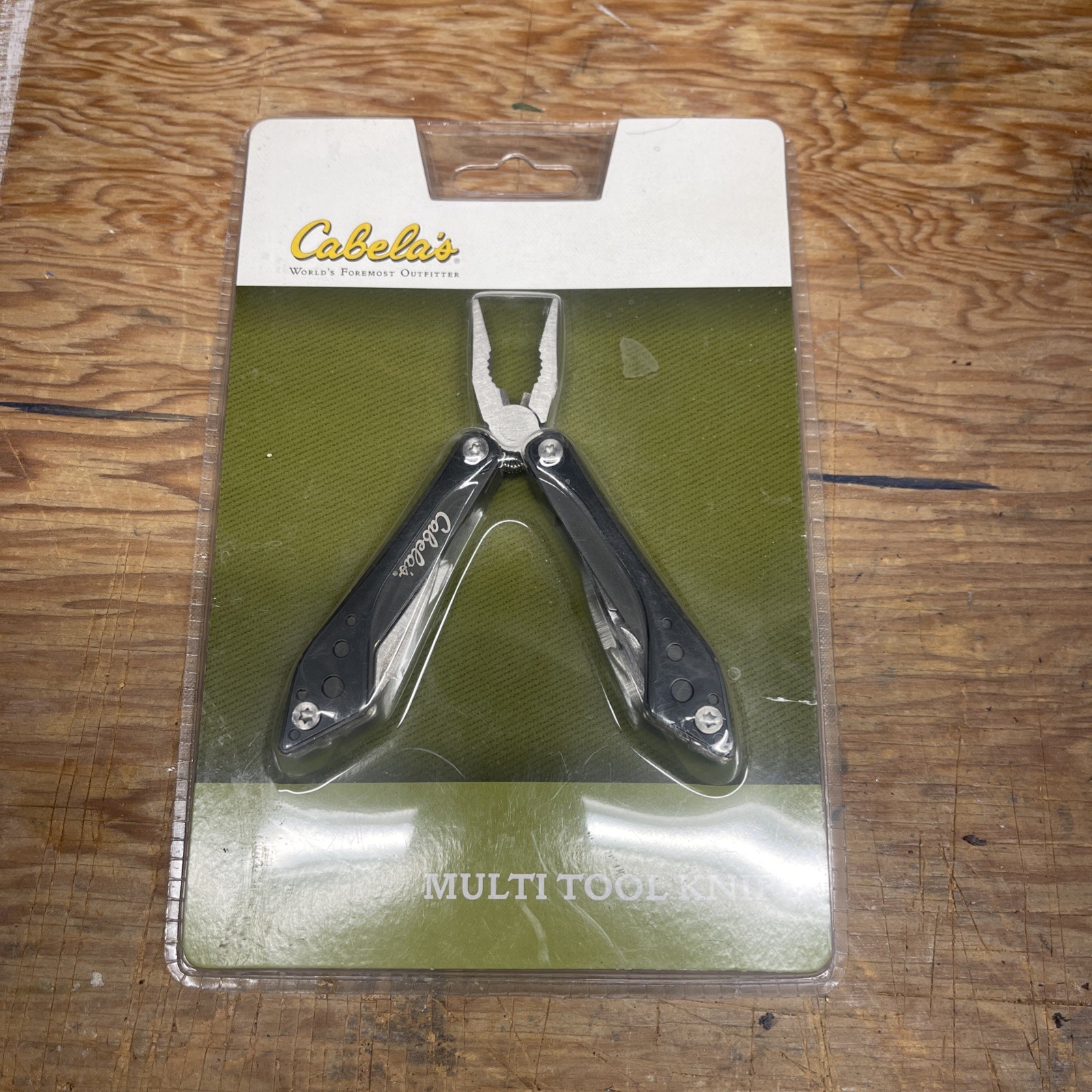 New Cabelas Multitool Purple Pliers Screwdriver Saw Knife Handyman