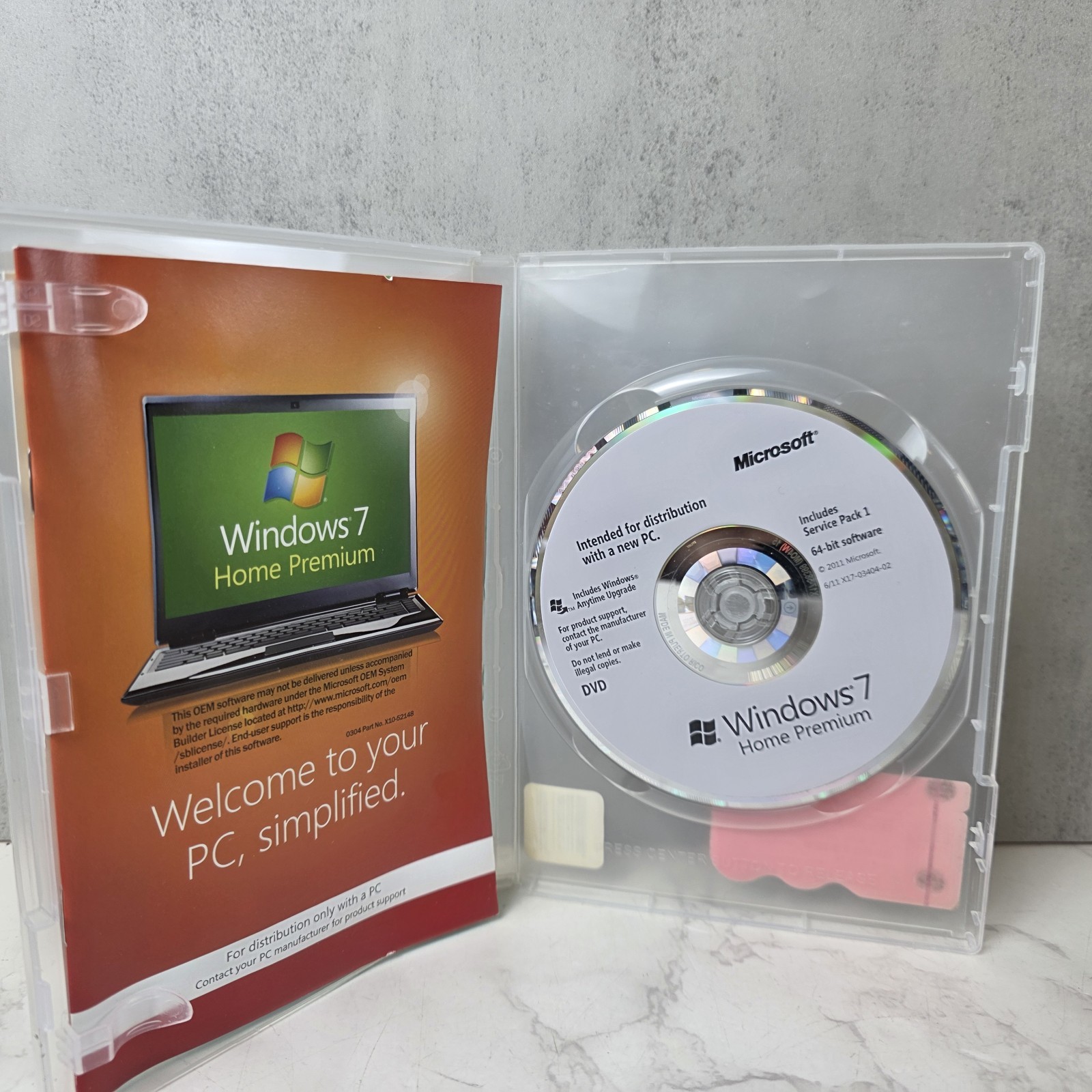 Microsoft Windows 7 Home Premium 64-bit Service Pack 1 OEM DVD with Manuals