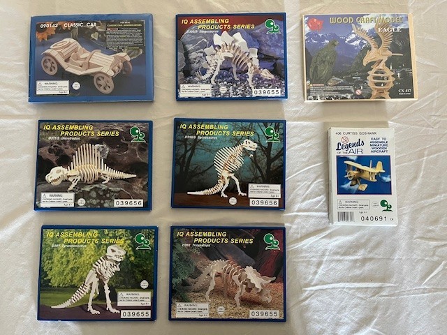 Lot of 8 Sealed Wooden Model Kits IQ Products Kids Dinosaur, car, airplane
