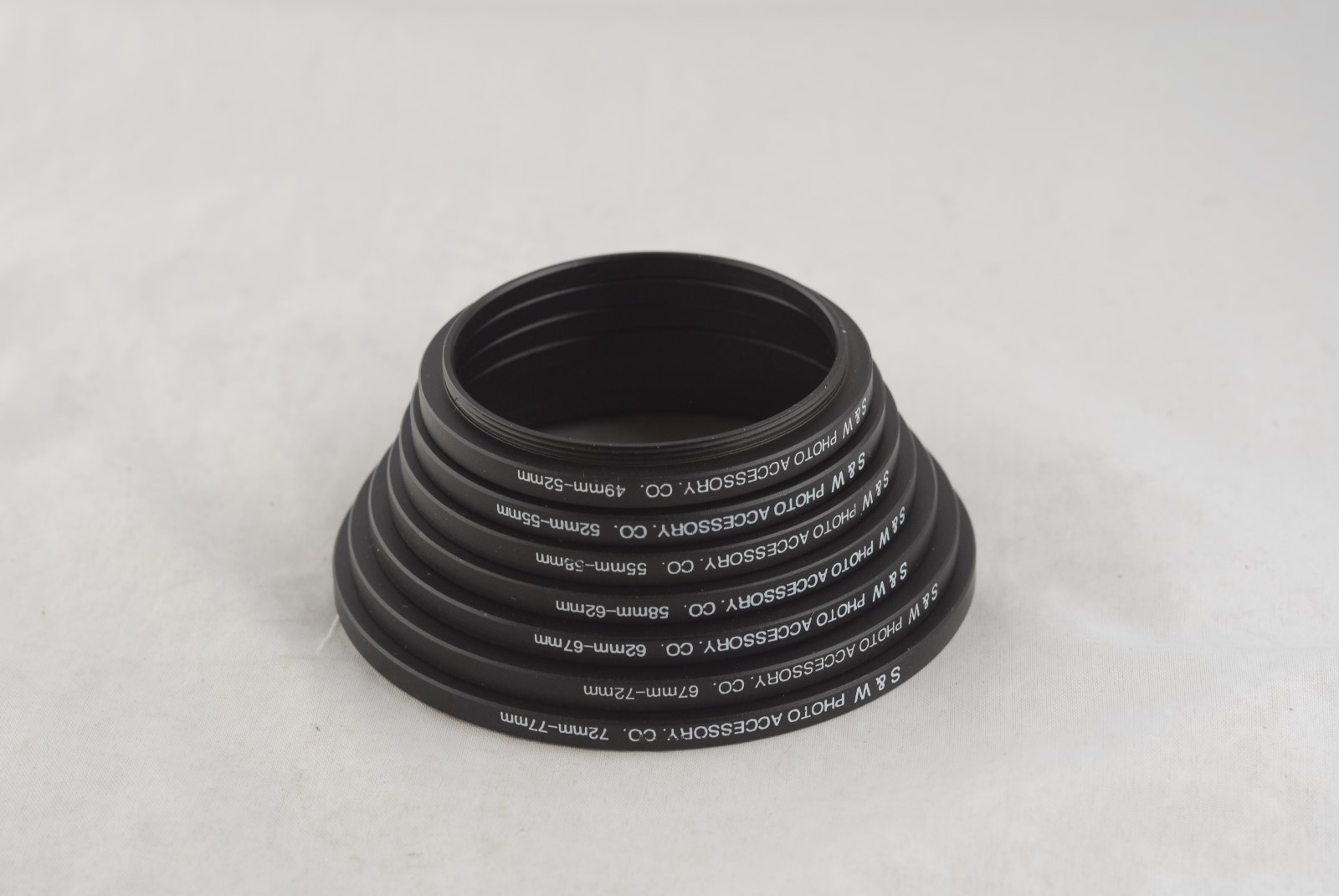 New 49mm to 77mm Metal Step-Up Ring Set Seven(7) Rings 49-52-55-58-62-67-72-77