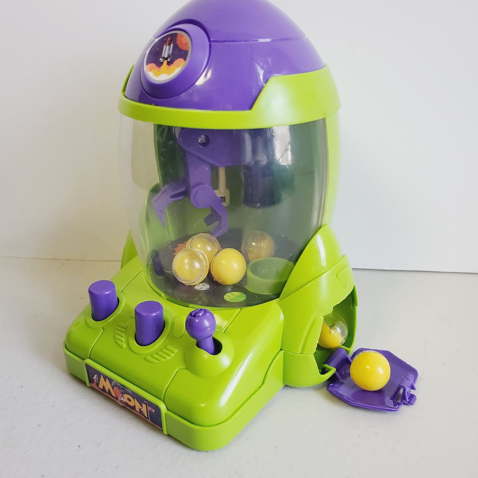 Mini Crane Game Machine. Space Rocket Ship. Handheld. W Opening Balls. ONLY 5" T