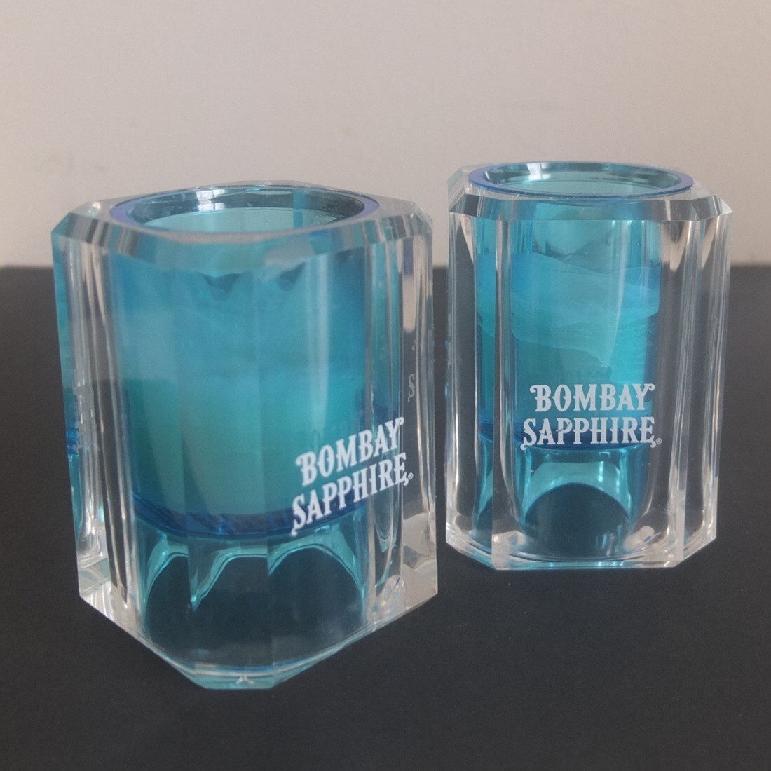 BOMBAY SAPPHIRE Gin candle pair—thick Lucite holders, 3¼” tall—excellent cond.
