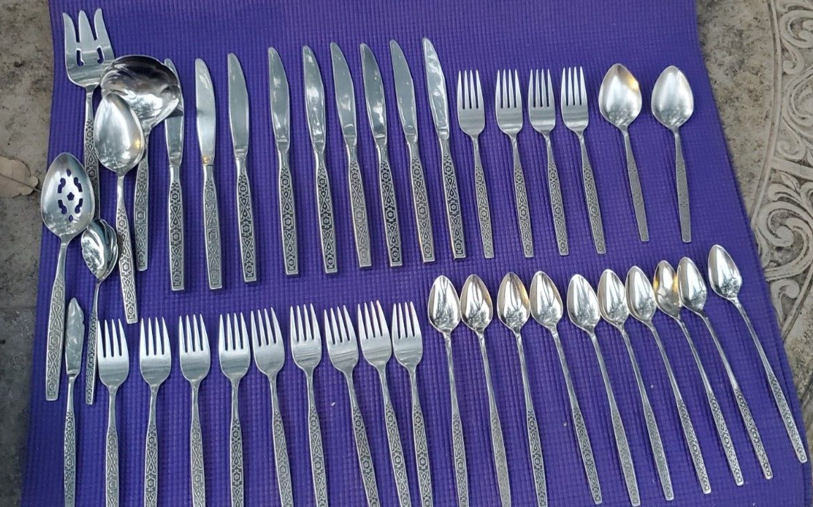 41 pcs Mid century modern flatware in the Spanish Mood pattern Oneida Stainless