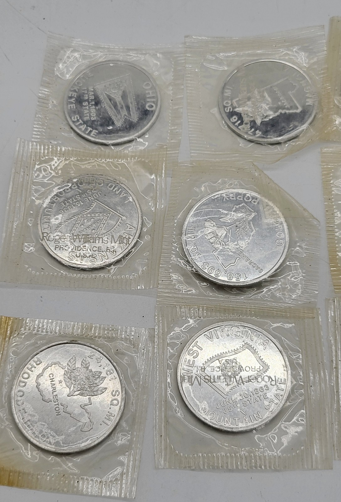 13 Roger Williams Mint state coins, all sealed