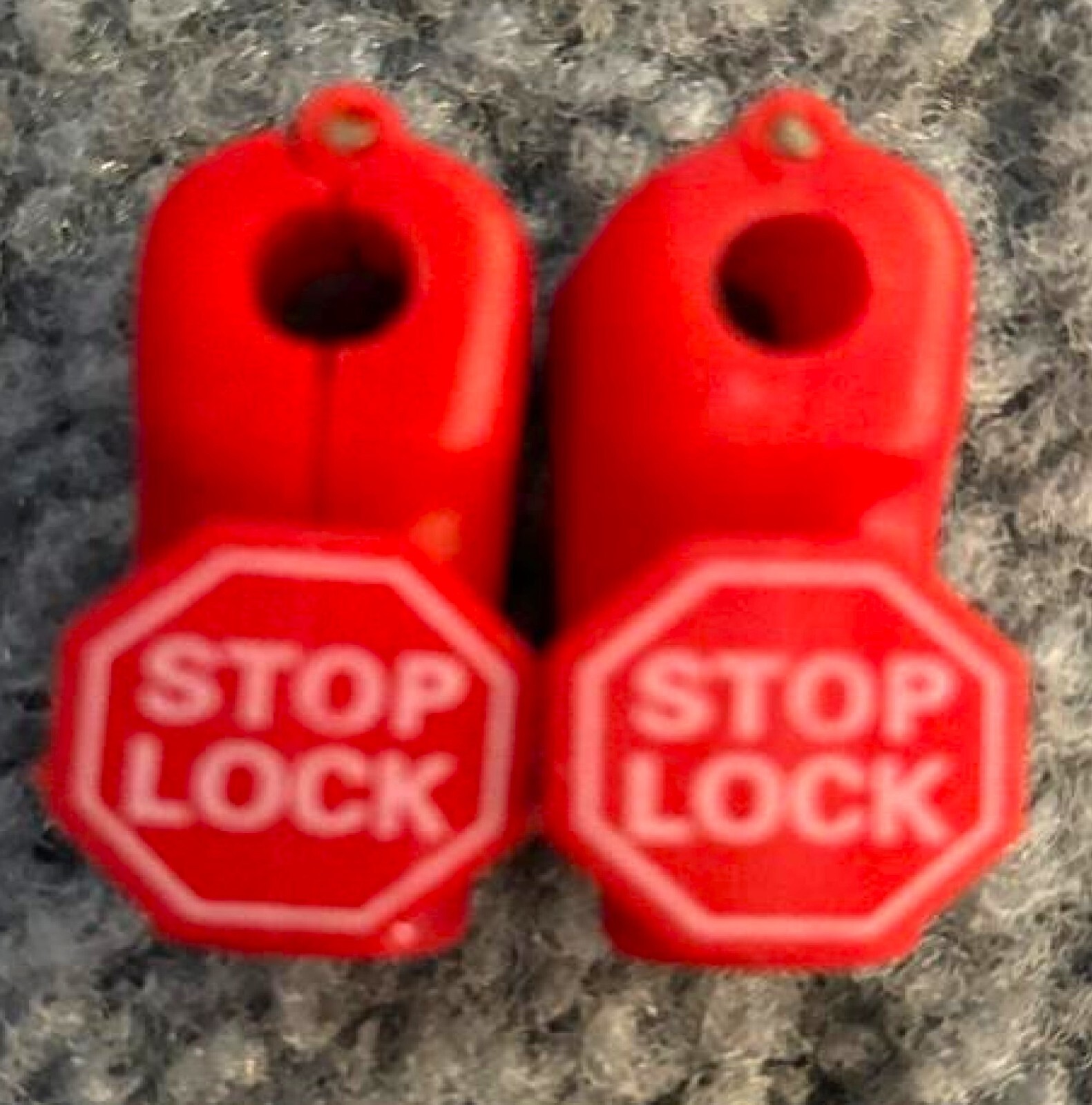 STOP LOCKS, RETAIL PEG HOOK ANTI SWEEP LOCKS (Bag of 50)