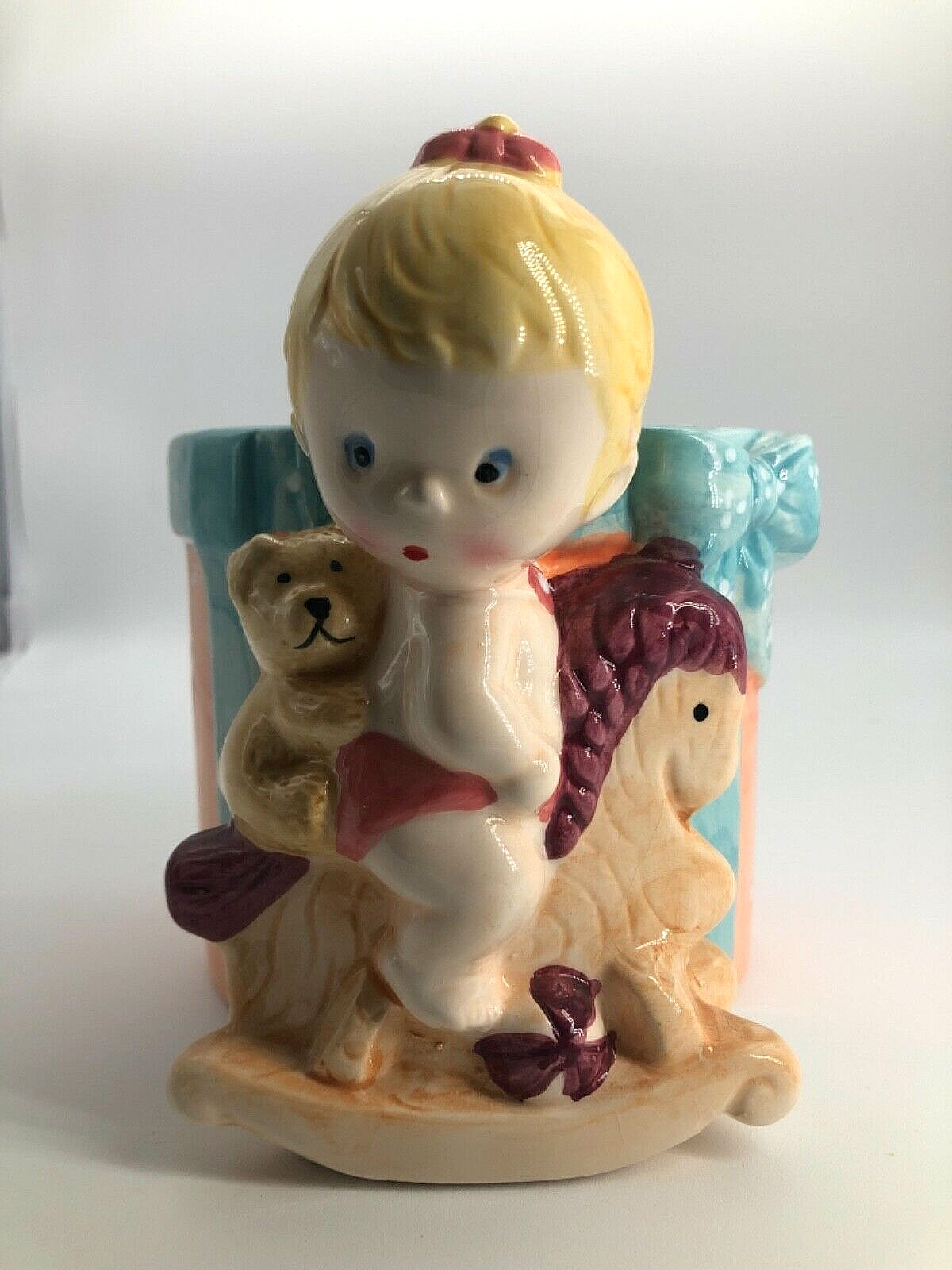 Nursery Planter. Baby on Rocking Horse with Teddy Bear.