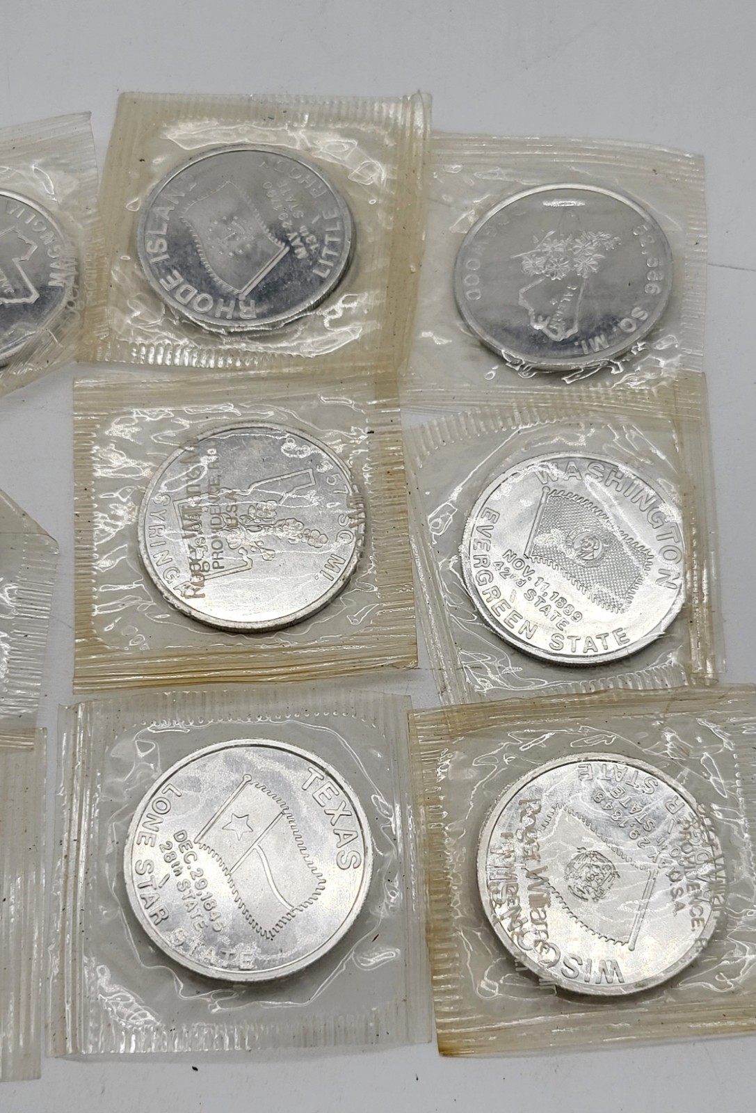 13 Roger Williams Mint state coins, all sealed