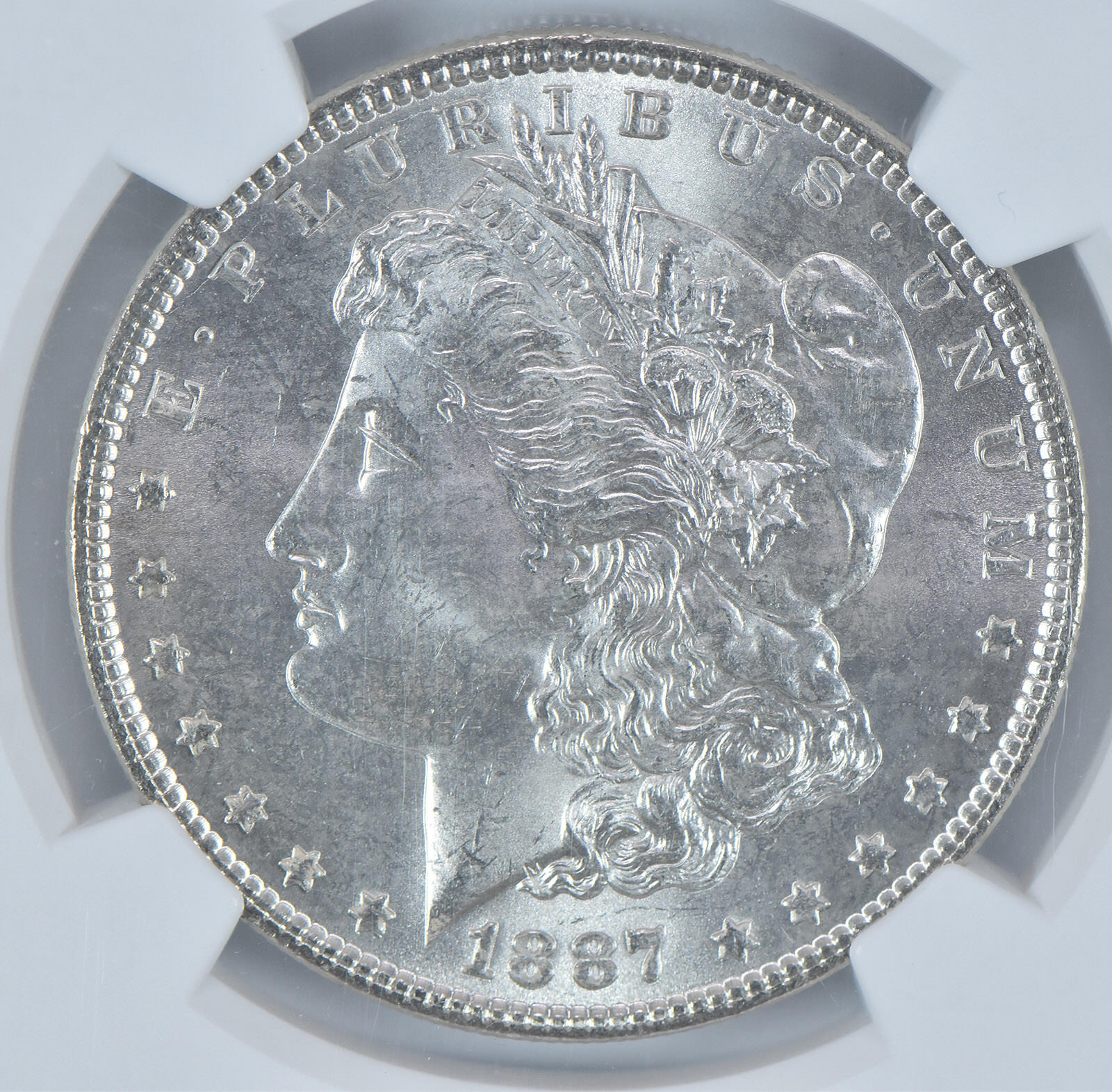 1887 Morgan Silver Dollar MS64 NGC Brown Label