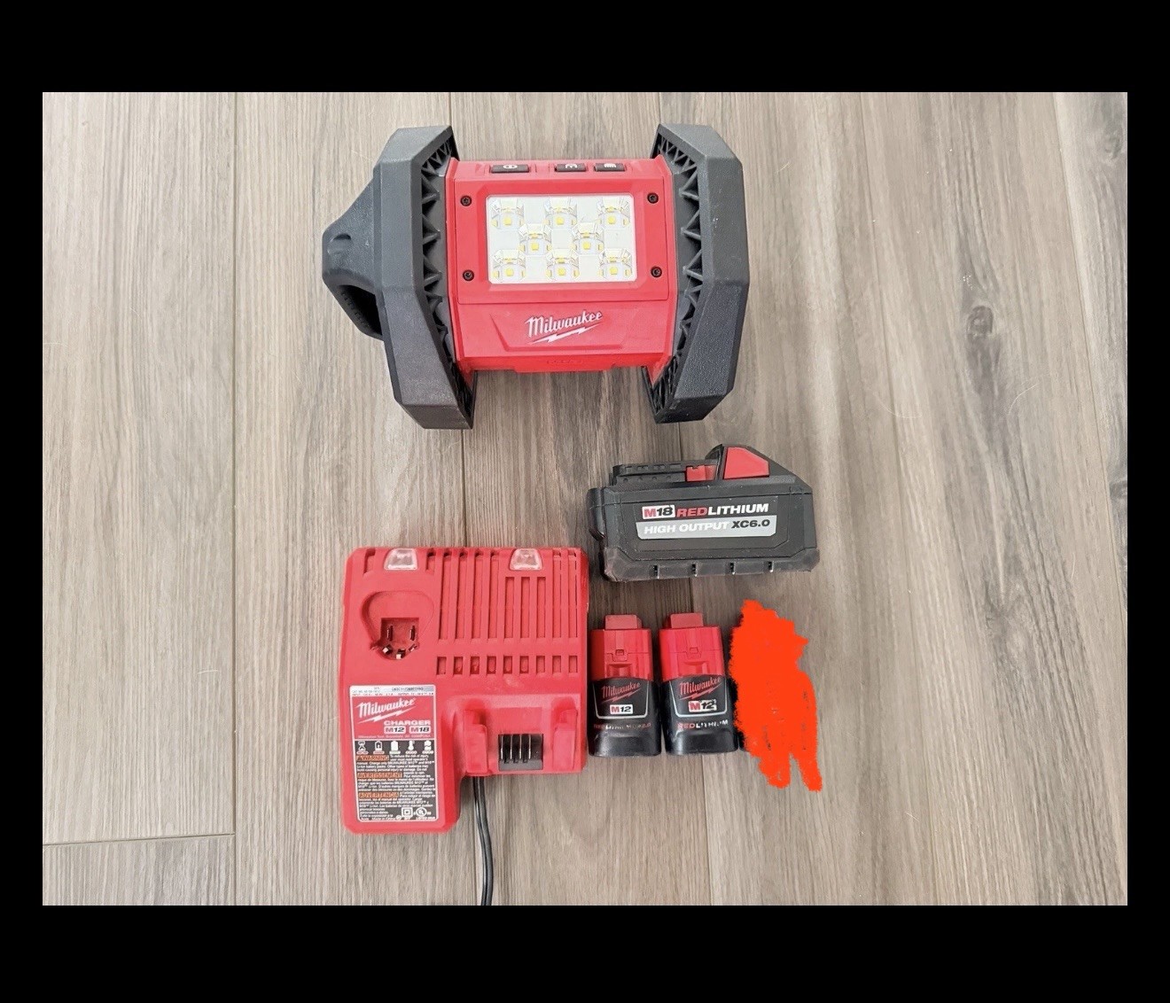 Milwauke Flood Light, Charger, 2 - 2.0 M12 Batteries and 1 - M18 High Output 6.0