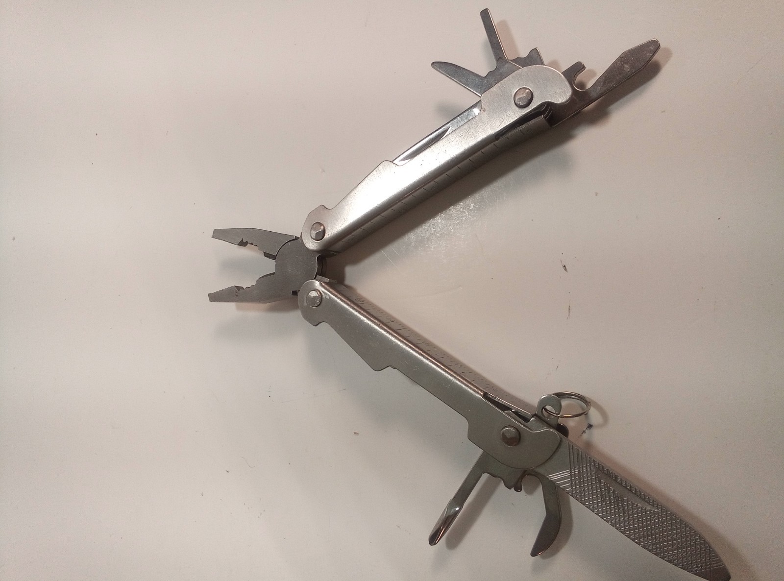 Silver Metal Multi-Tool with Pliers and Fold-Out Tools (U-10)