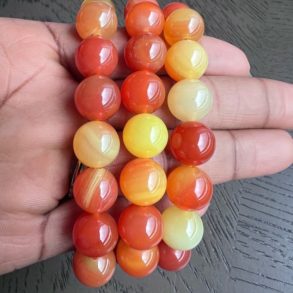 Orange agate bracelet 12mm 6.5’ (one)