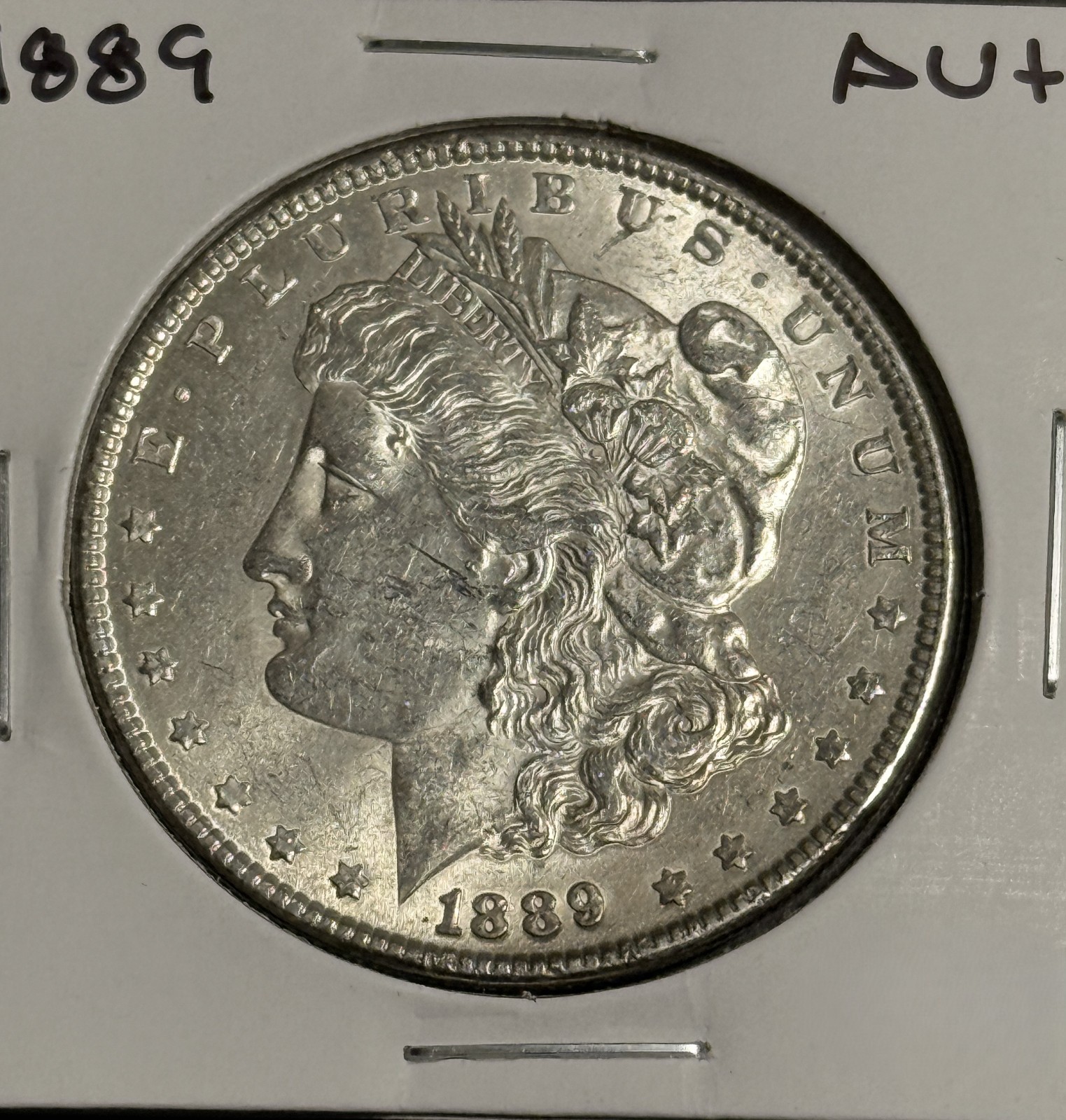 1889 Morgan Silver Dollar, AU+ Details. (18928)