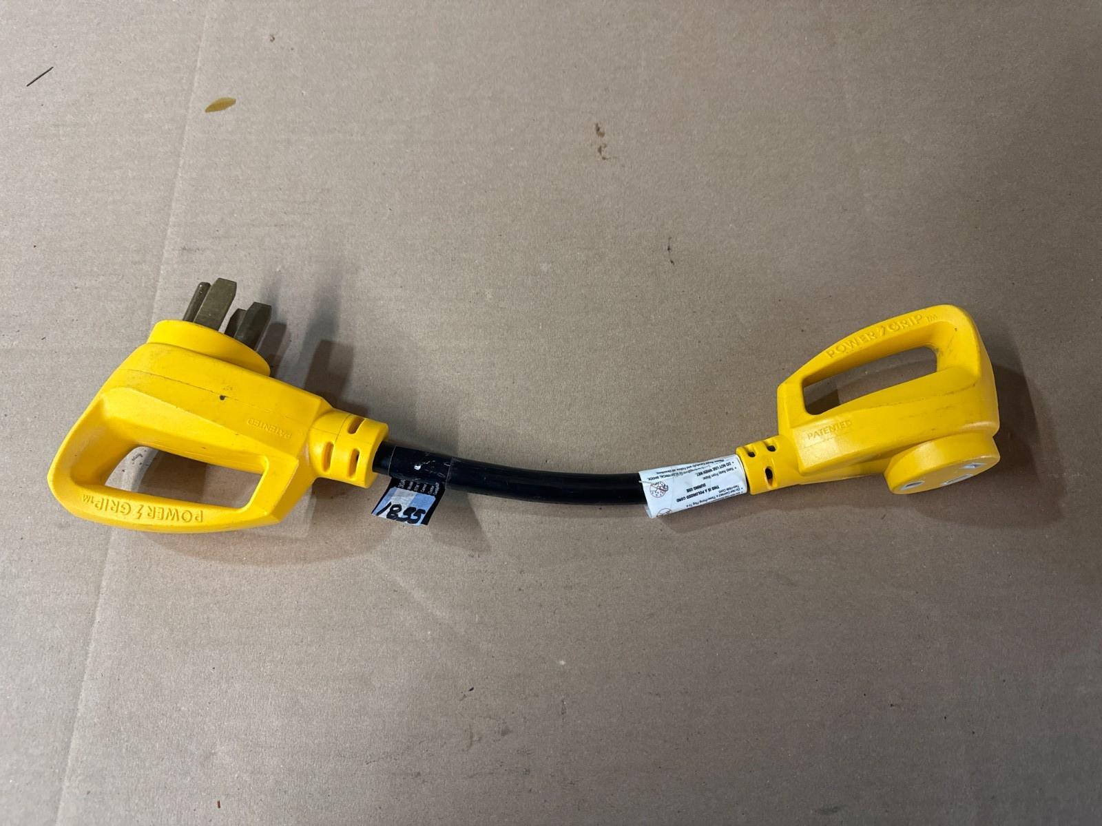 Camco Power Grip Intertek 5012408 15-30- RV Camper/ Dog Bone Electrical Adapter
