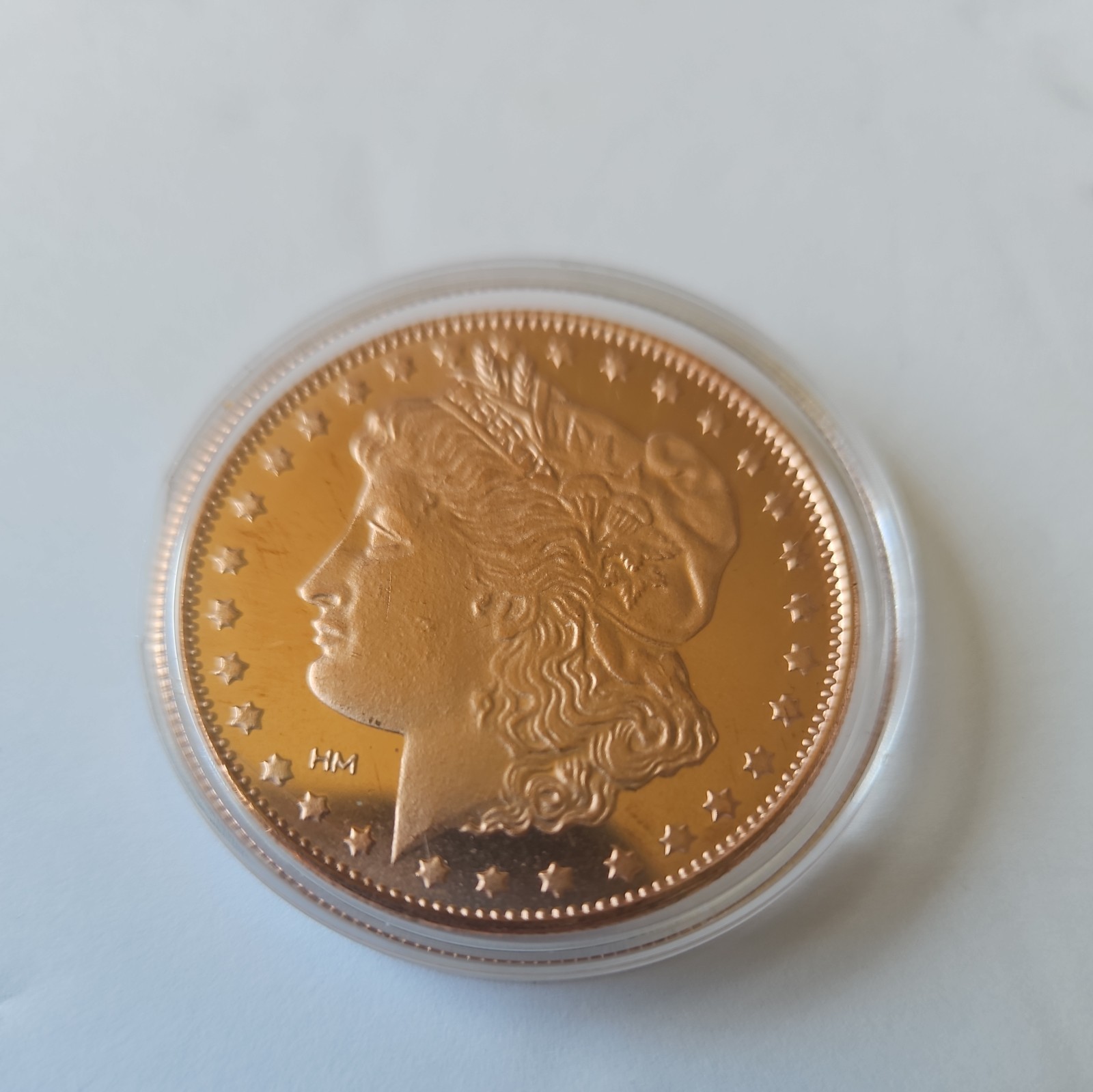 1 oz .999 Fine Copper Round of Morgan Dollar Coin.  **IN CAPSULE**