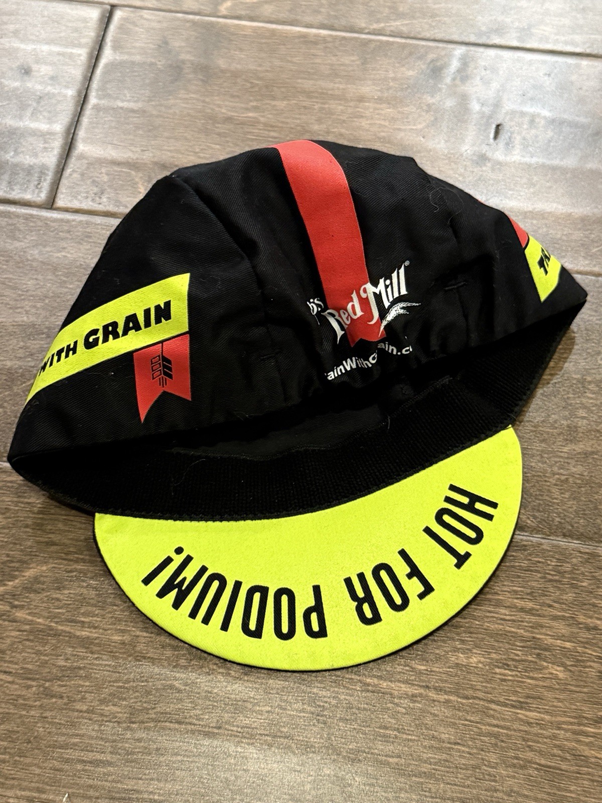 Bobs Red Mill Train With Grain Hot For Podium Black Cycling Stretched Hat Cap