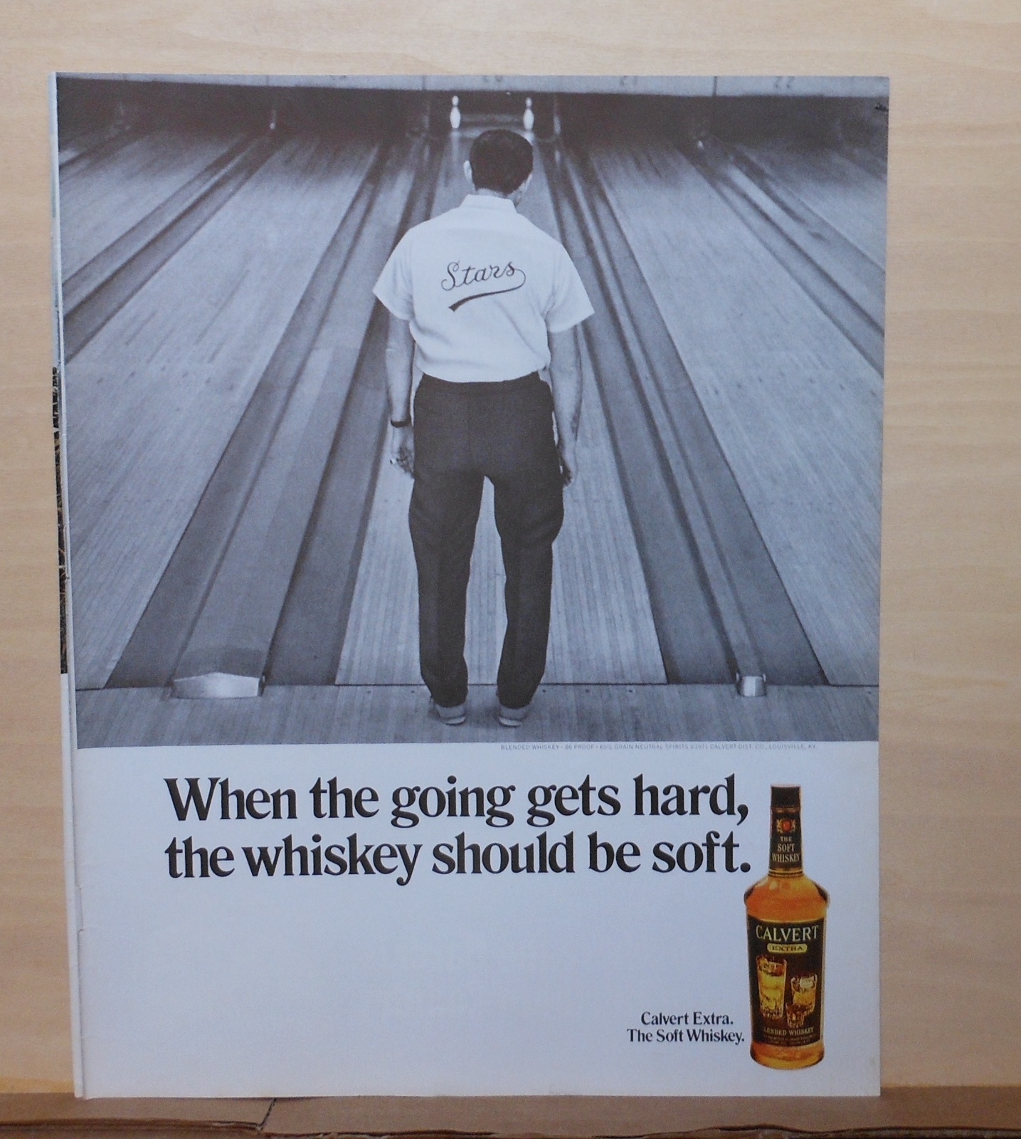 1971 magazine ad for Calvert Whiskey - sad bowler ponders 7-10 split photo
