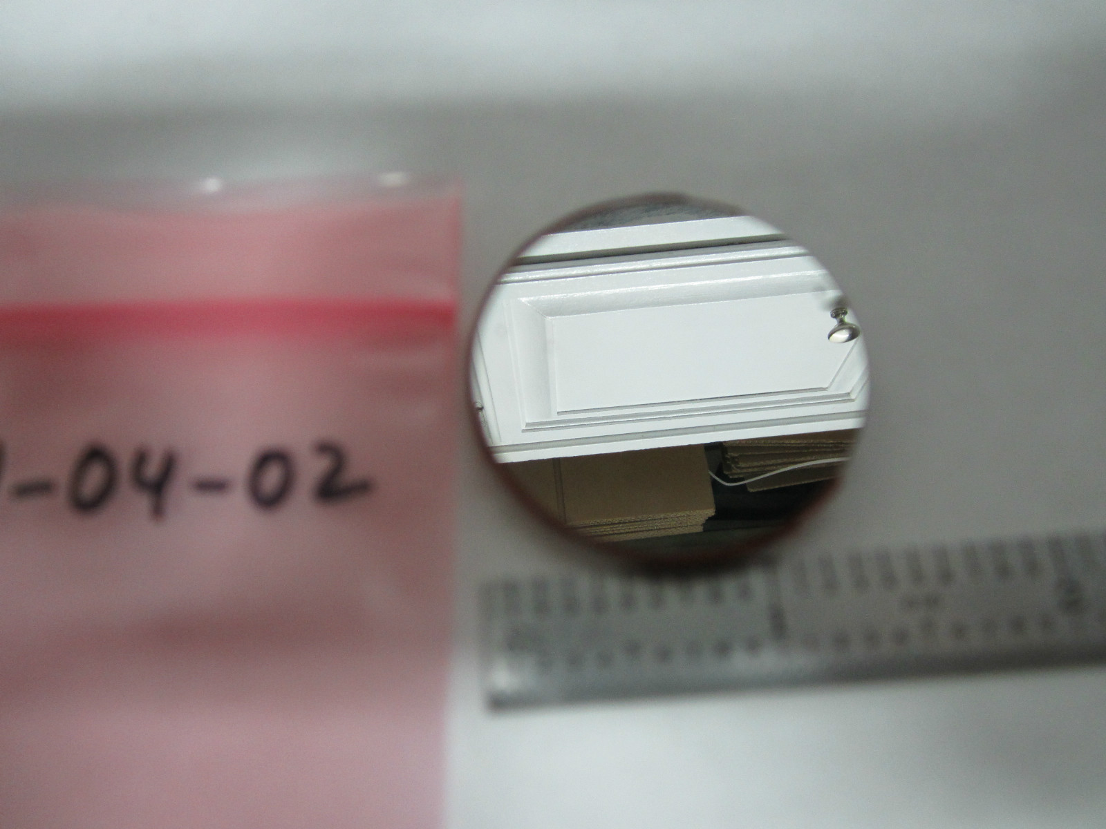 OPTICAL FILTER REMOVED FROM INSTRUMENT #1-04-02 LASER OPTICS BIN#1