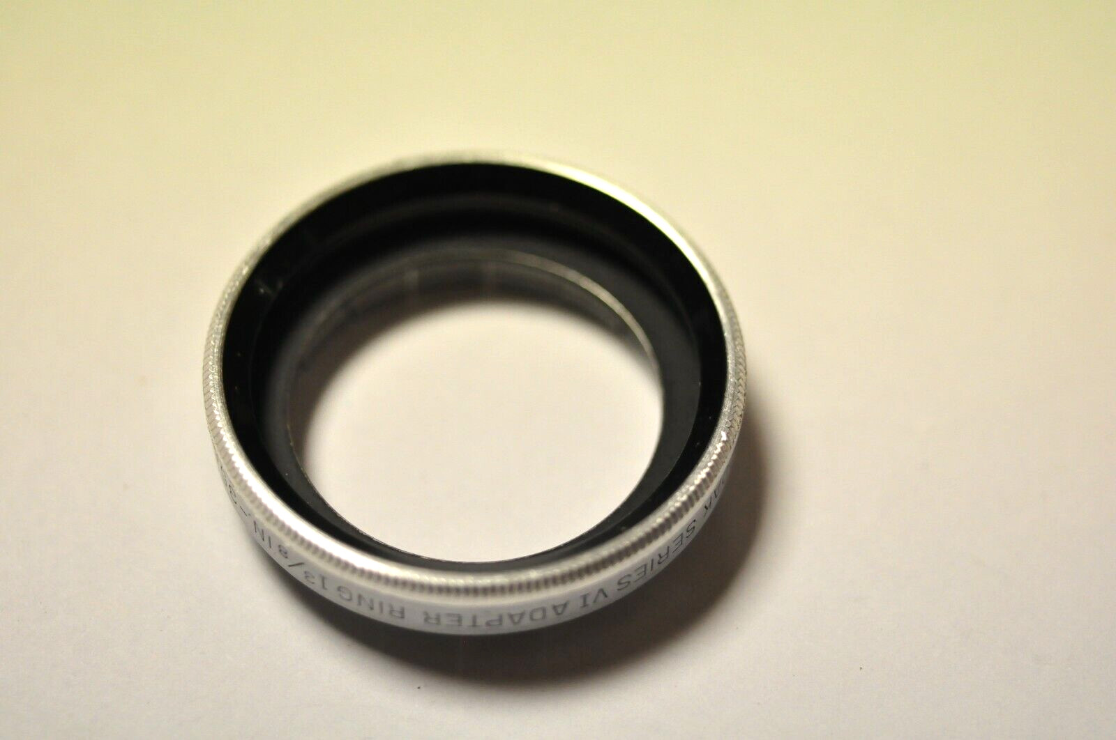 Kodak push on adapter with 35mm / 1 3/8" fitting to accept series VI filters.