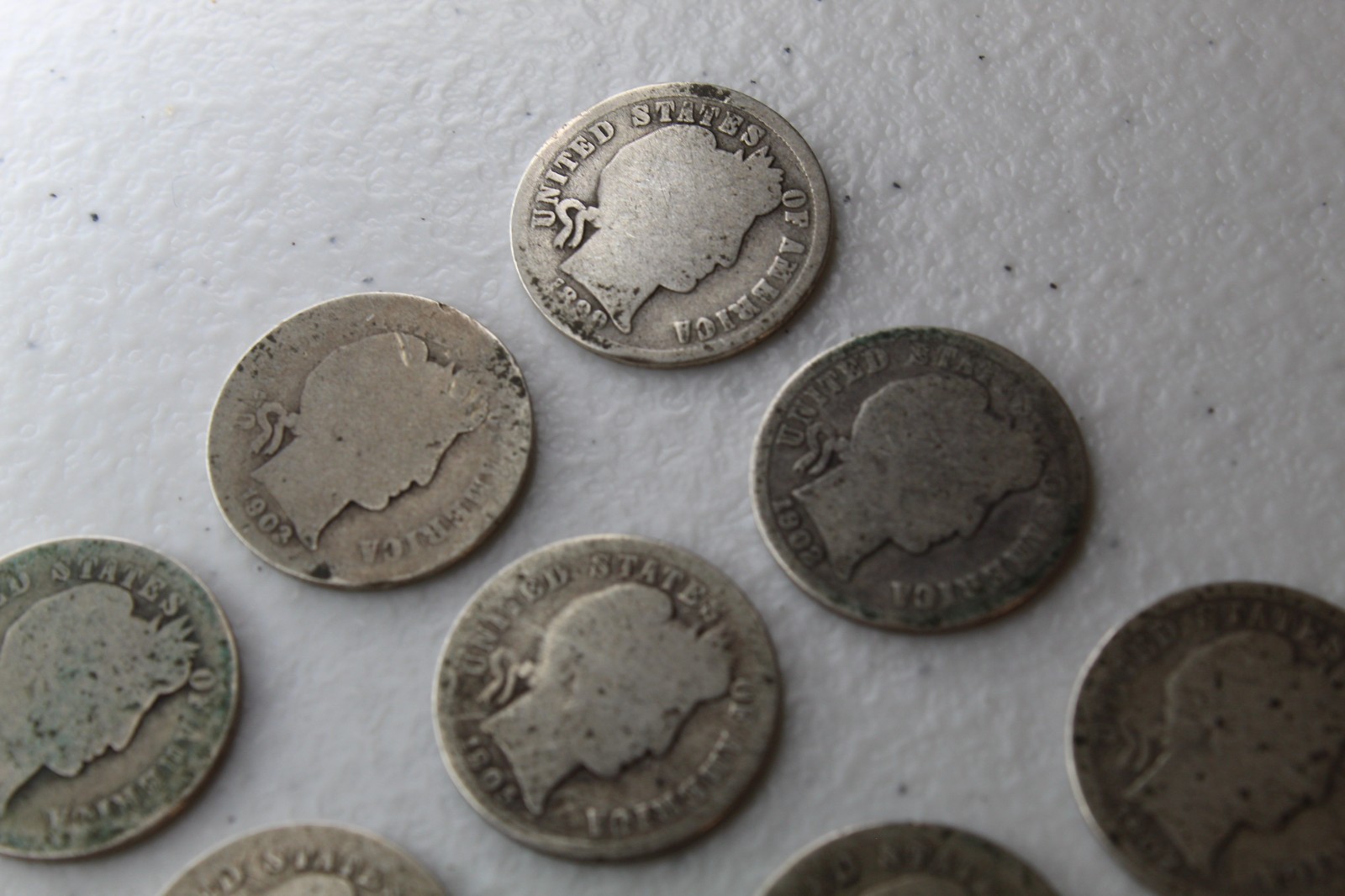 12 Very Old Very Worn Barber Dimes with dates