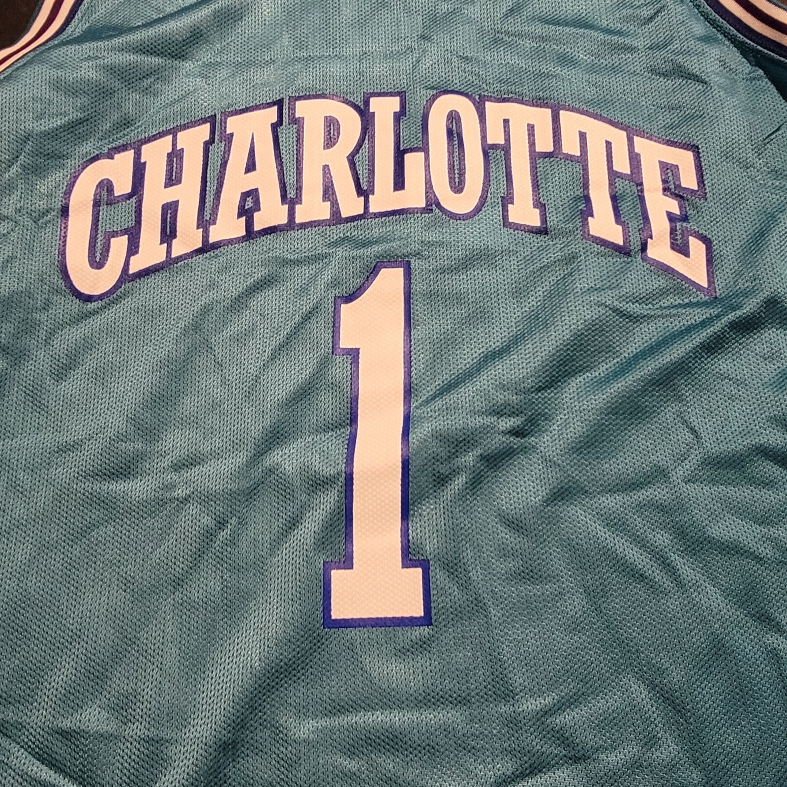 Vintage Mugsy Bouges Charlotte Hornets Basketball Jersey. Size 48