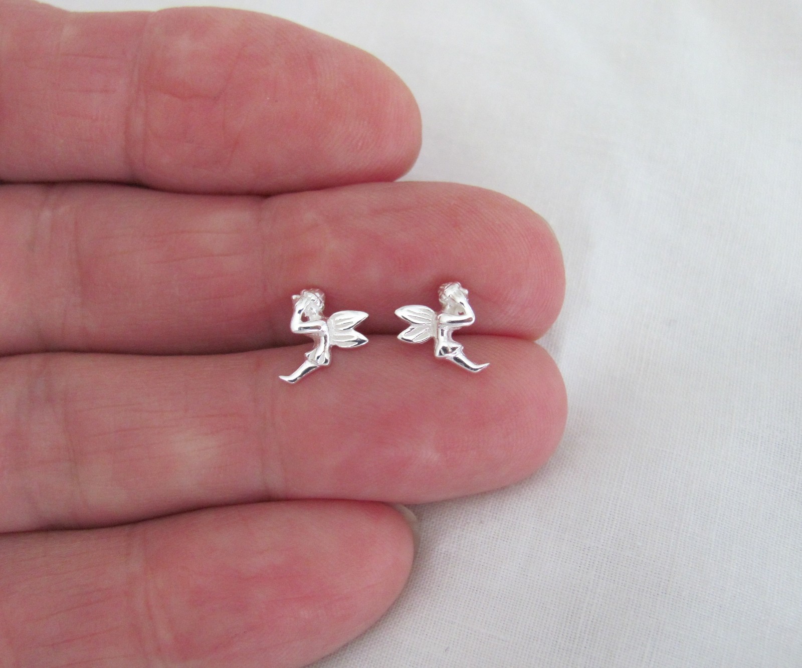 Sterling Silver 9mm pixie post stud earrings.