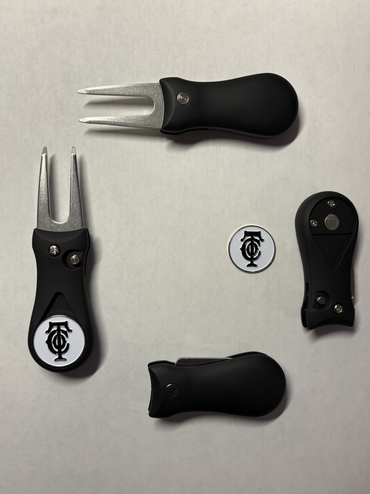 (1)  Switchblade Golf Divot Tool & (1) Old Town Club 1" Coin Style Golf Marker