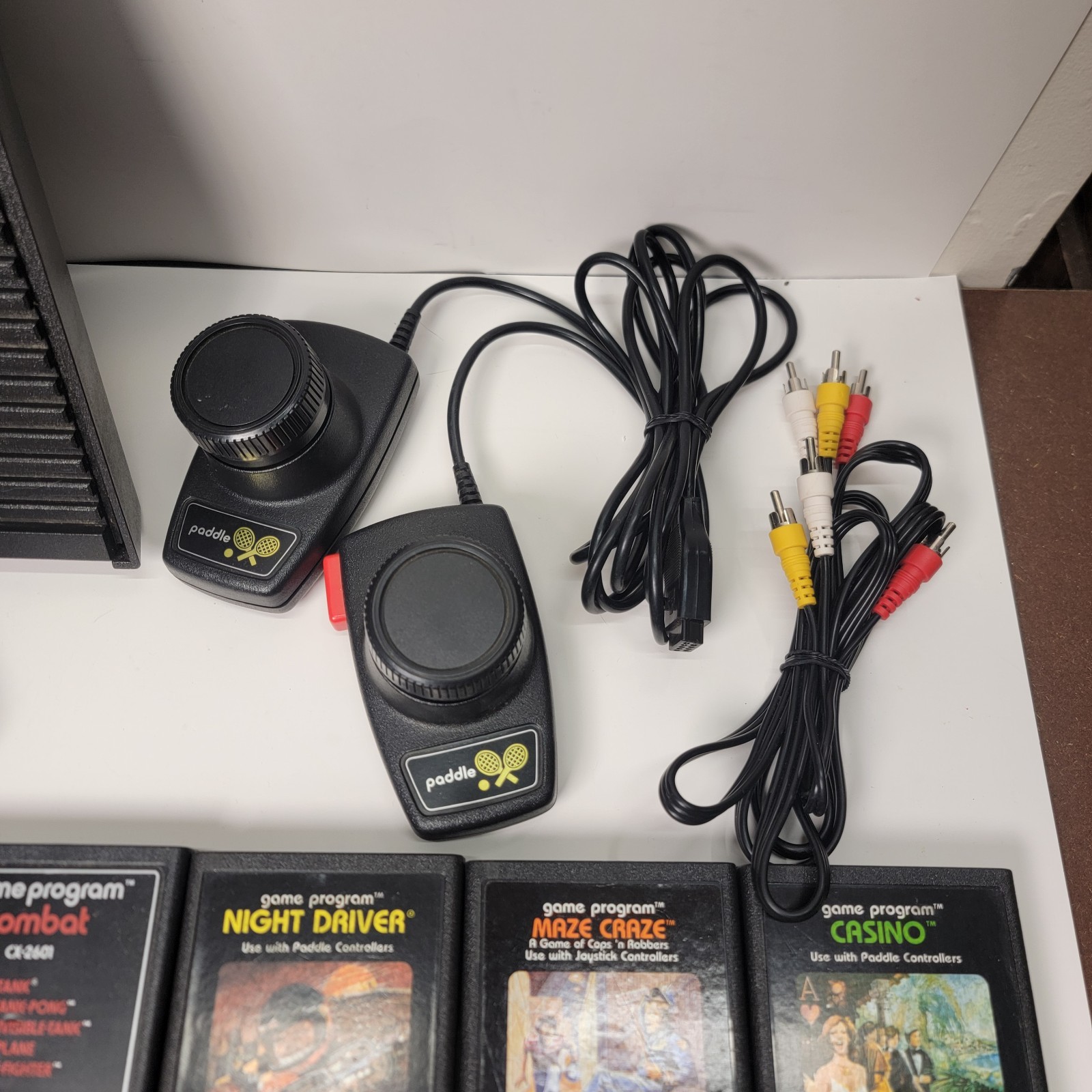 Atari 2600 Console * Controllers * Games ** Large Lot ** Untested