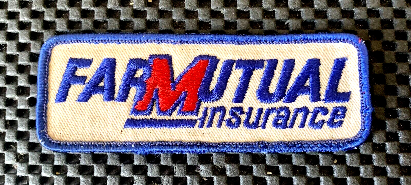 FARM MUTUAL INSURANCE EMBROIDERED SEW ON PATCH FARMERS INSURANCE 4 1/2 x 2  1/2"