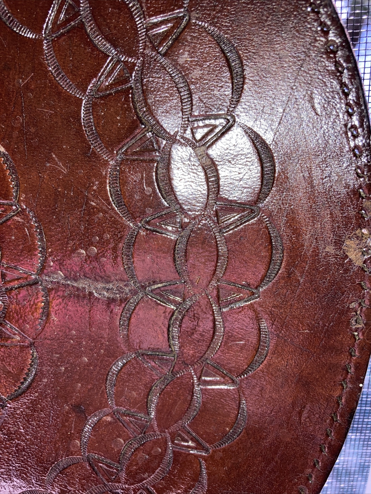 vintage embossed circular 12” leather piece