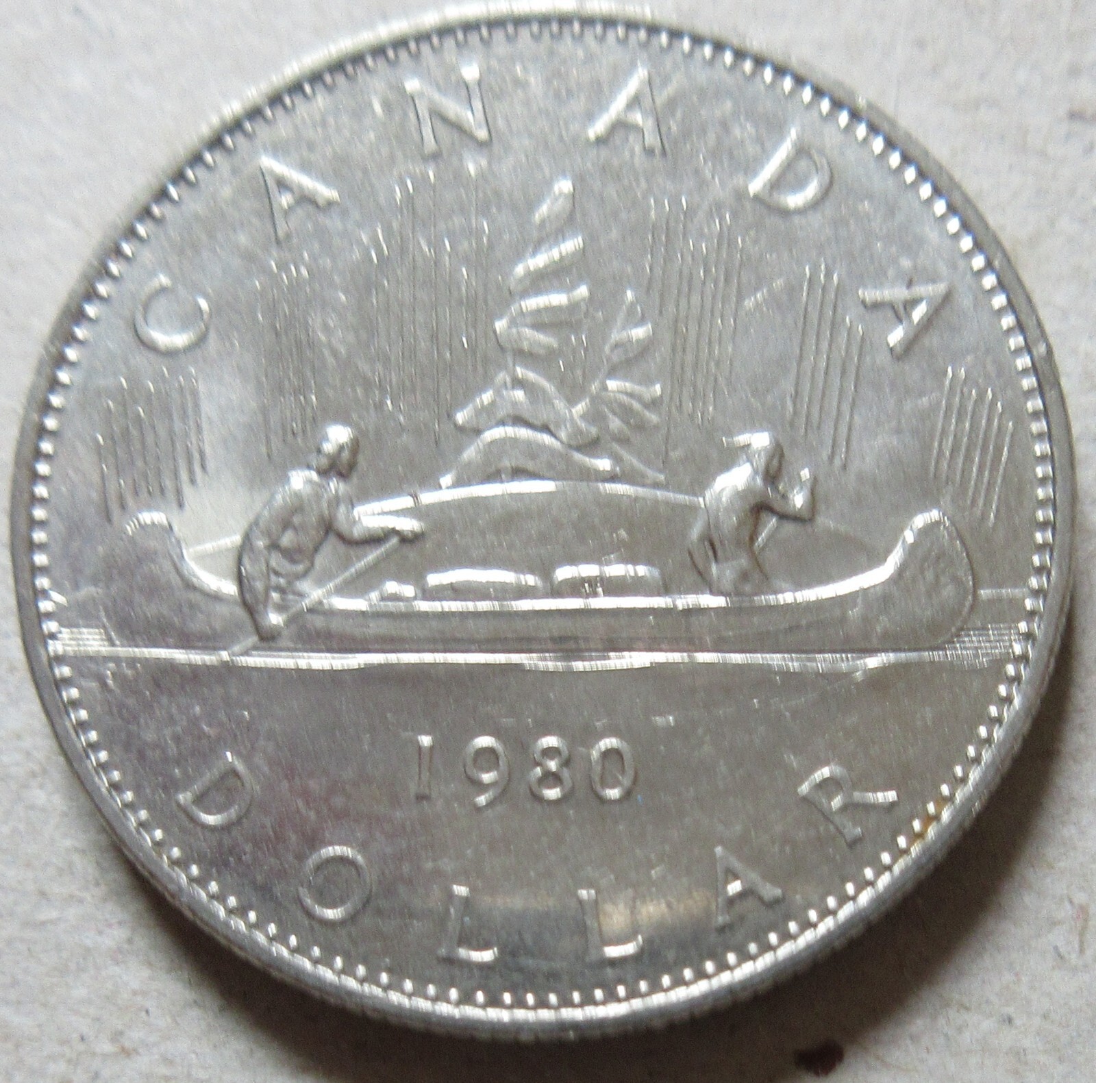 1980 Canada Voyageur Nickel One Dollar Coin. $1