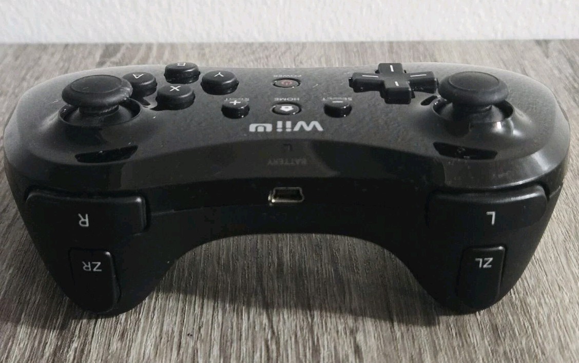 Official OEM Nintendo Wii U Black Wireless Pro Controller Used.