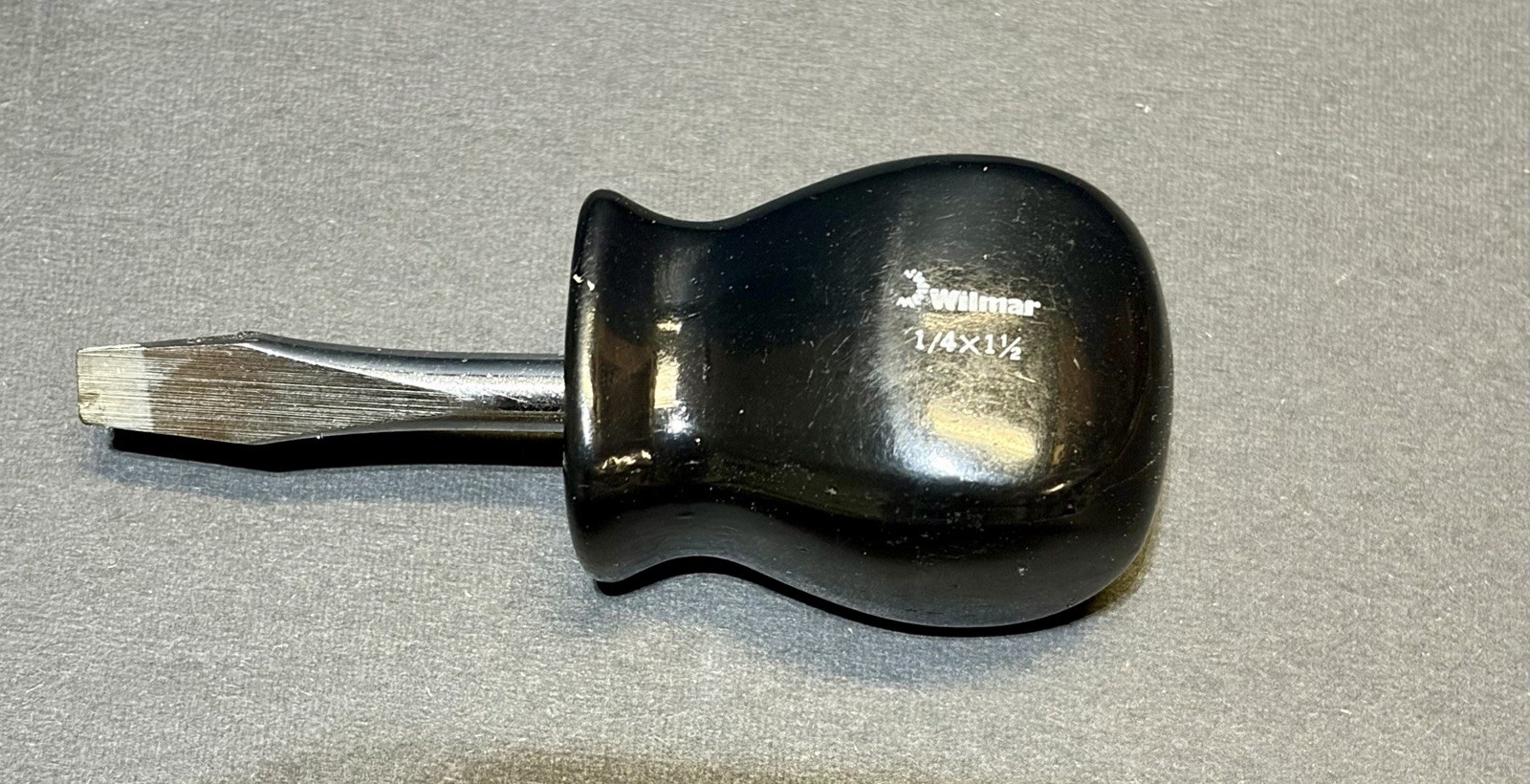 This is a Wilmar 1/4" x 1-1/2" stubby slotted screwdriver