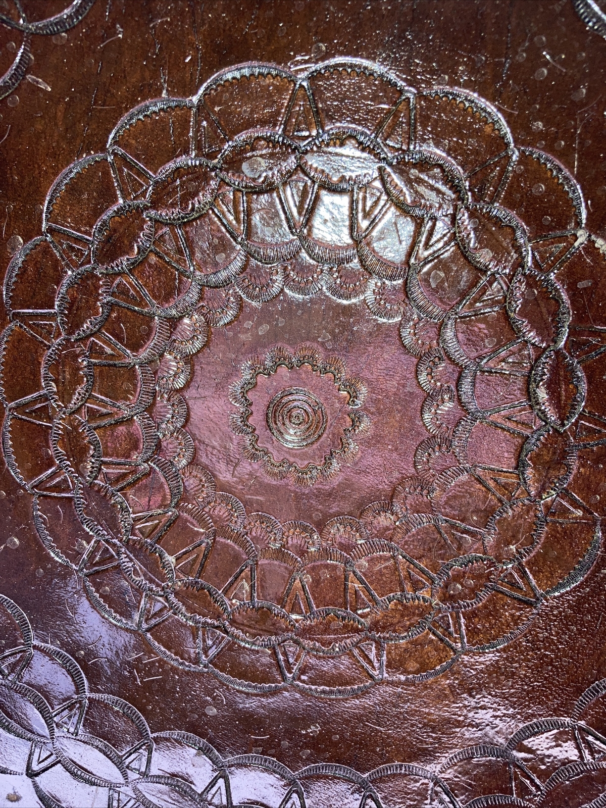 vintage embossed circular 12” leather piece
