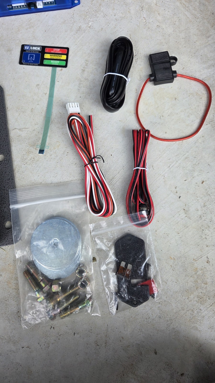 EZ Lock wheelchair lock down device like Qstraint QLock