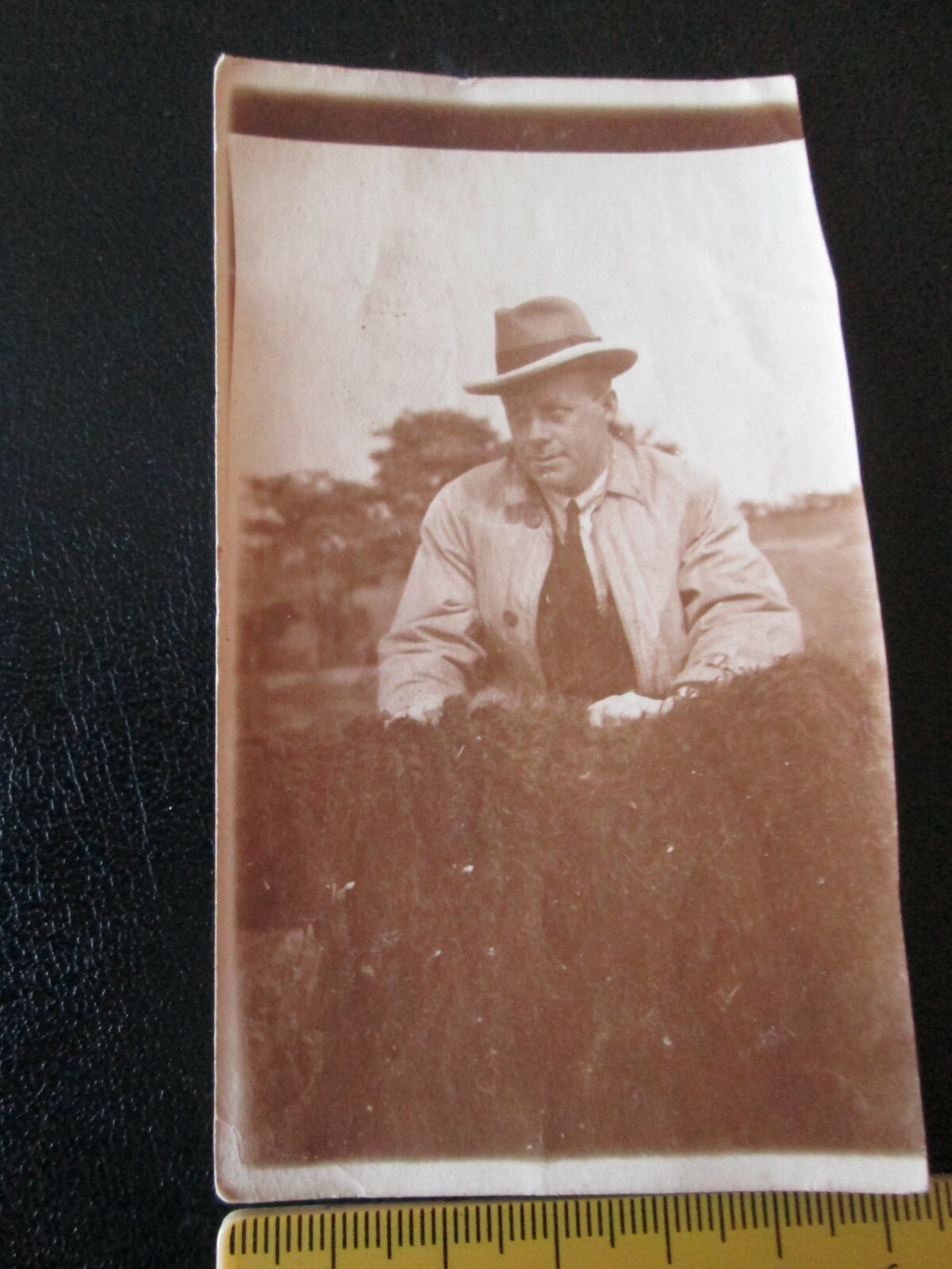 Photo of man wearing hat (unknown location, date, name) 11.5 x 6 cm approx