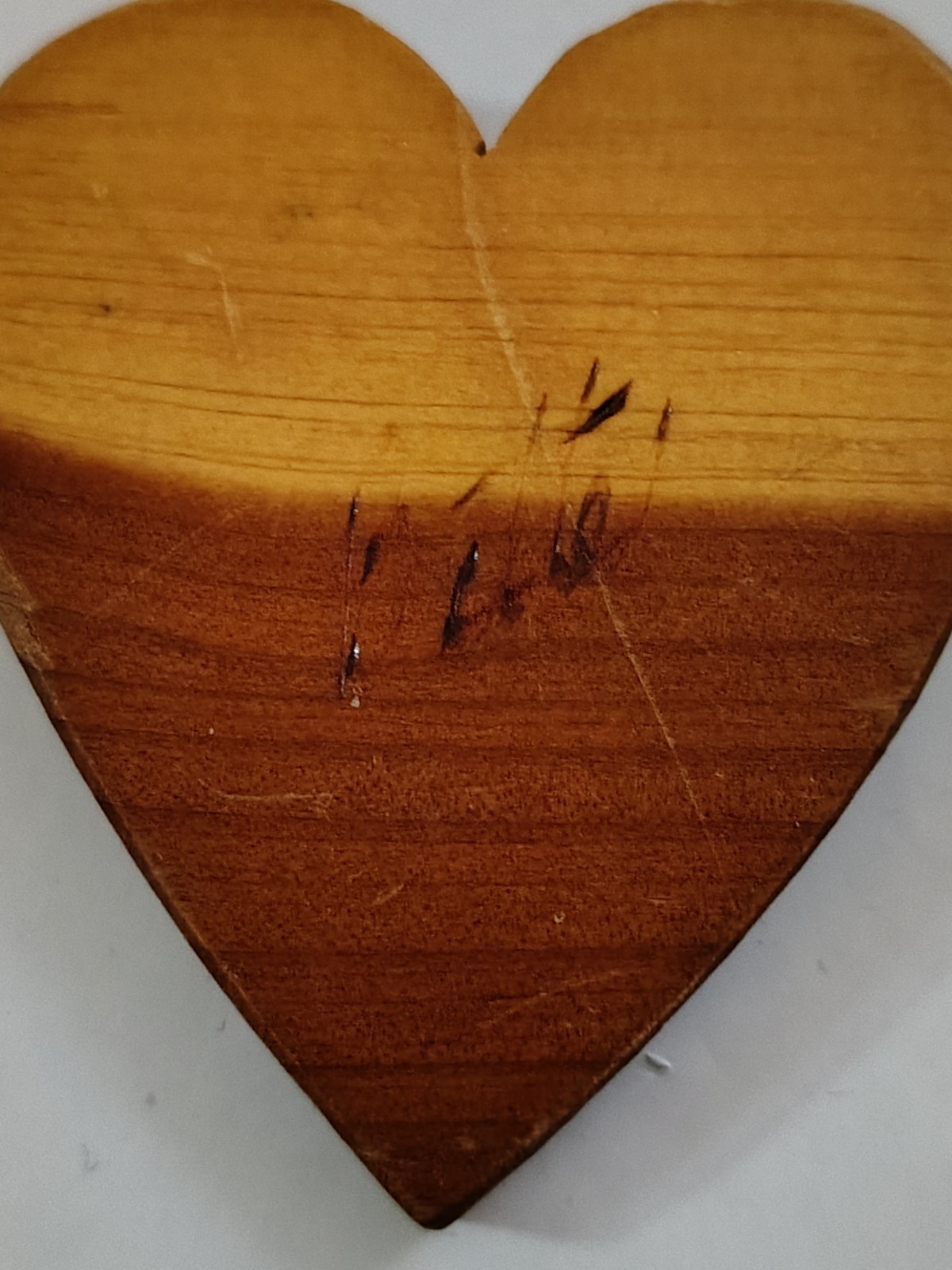 Wood Heart With Bette Carved Into It Very Light