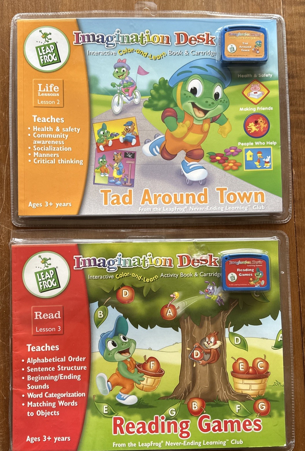 2 Imagination Desk Books & Cartridges Tad Around Town & Reading Games ￼