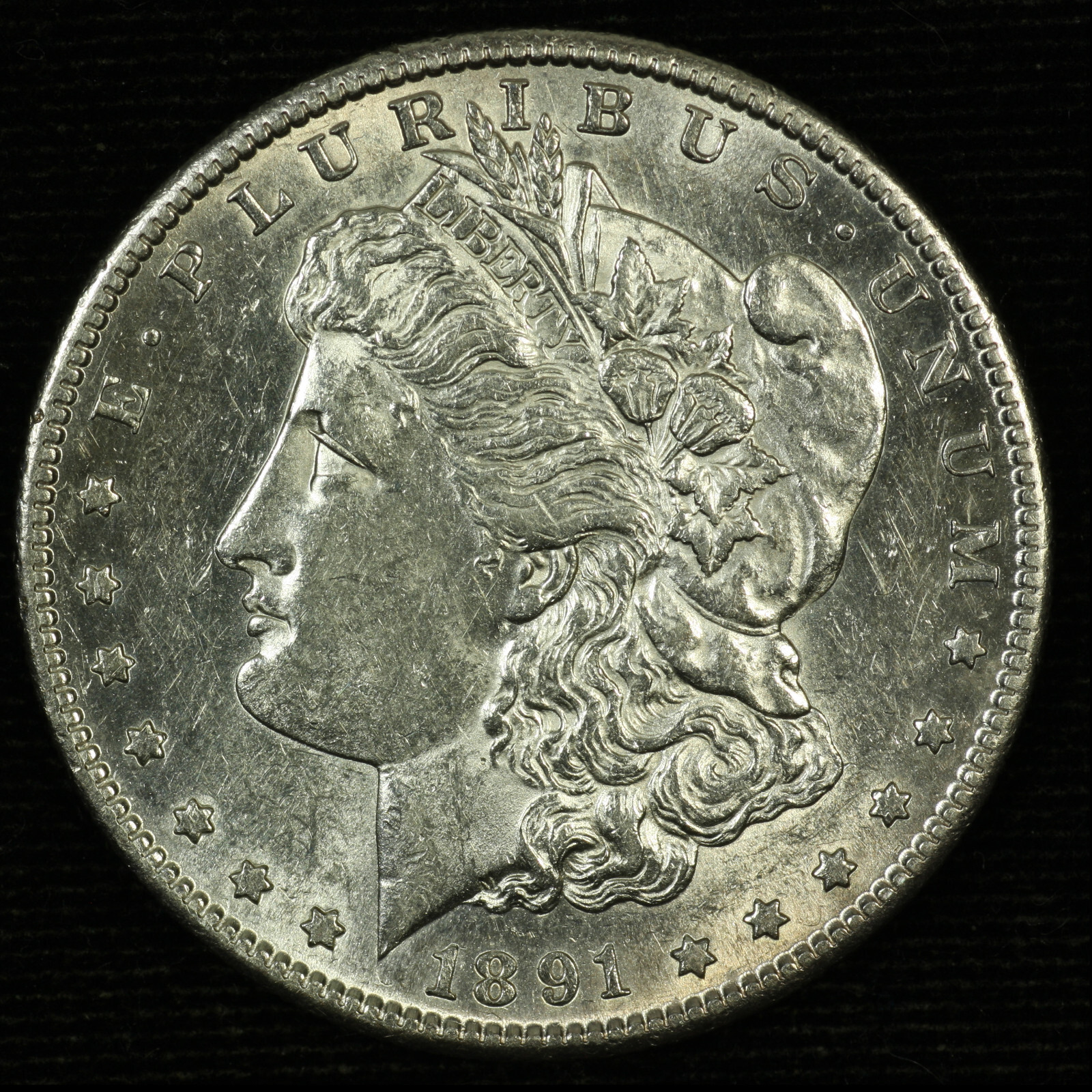Morgan Silver Dollar. 1891 S. About Uncirculated. Lot # 9049-104-110