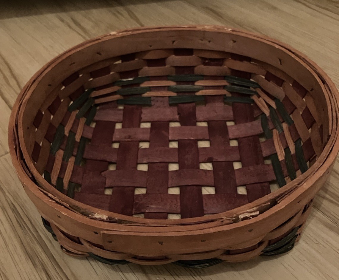 Handmade Basket  Round With Sq Bottom 8”x 4” Tacked Rim Green and Reddish Reeds