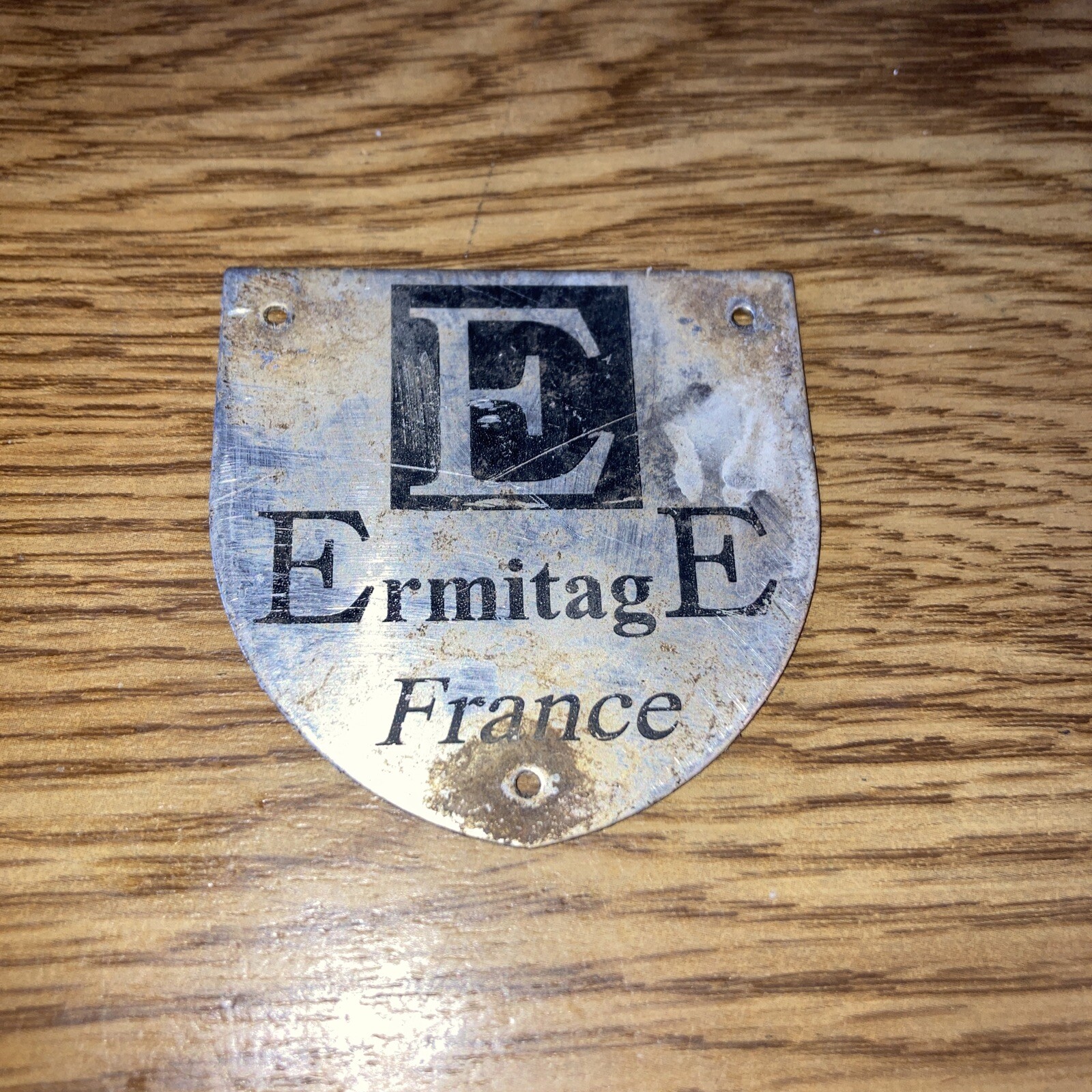 Vintage Metal ErmitagE France Logo Overlay 2" x 2"