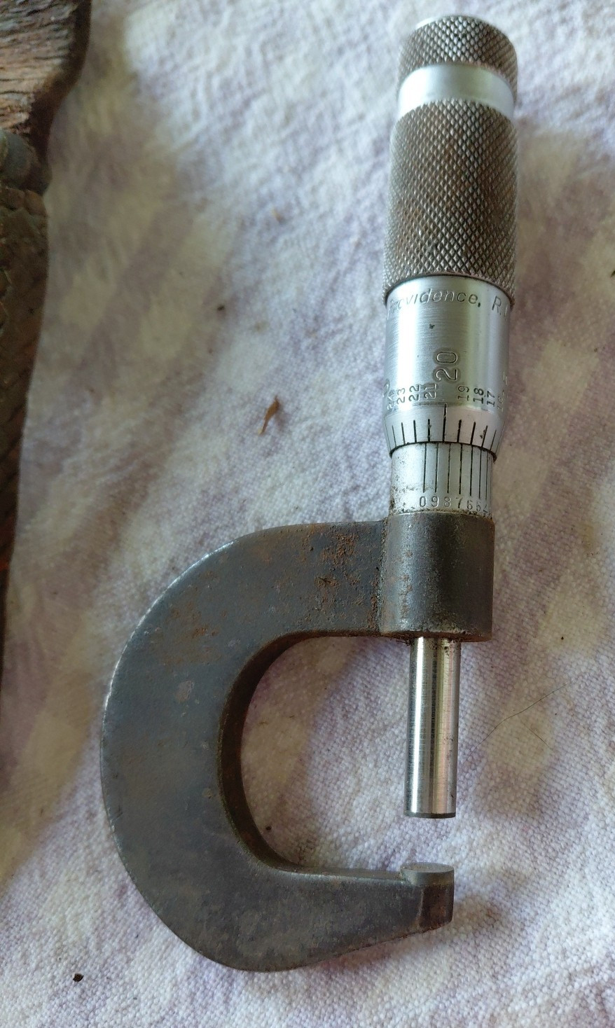 brown sharp micrometer and leather pouch