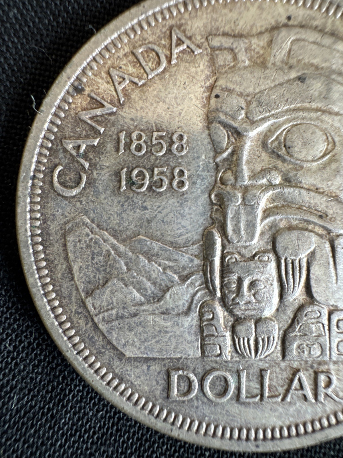 1958 canadian totem pole silver dollar