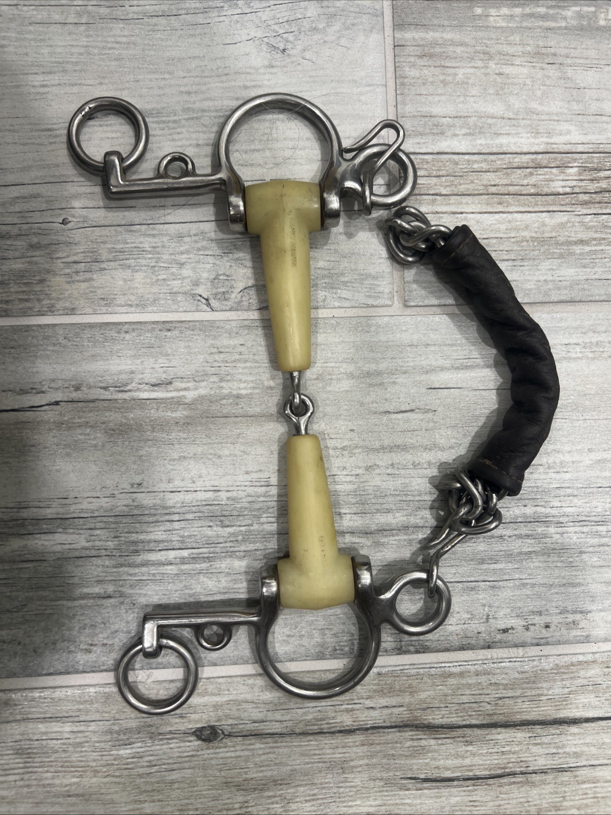 Happy mouth Rubber Pelham, 5 1/4 Inches Wide With A 4 Inch Shank, Leather Chain