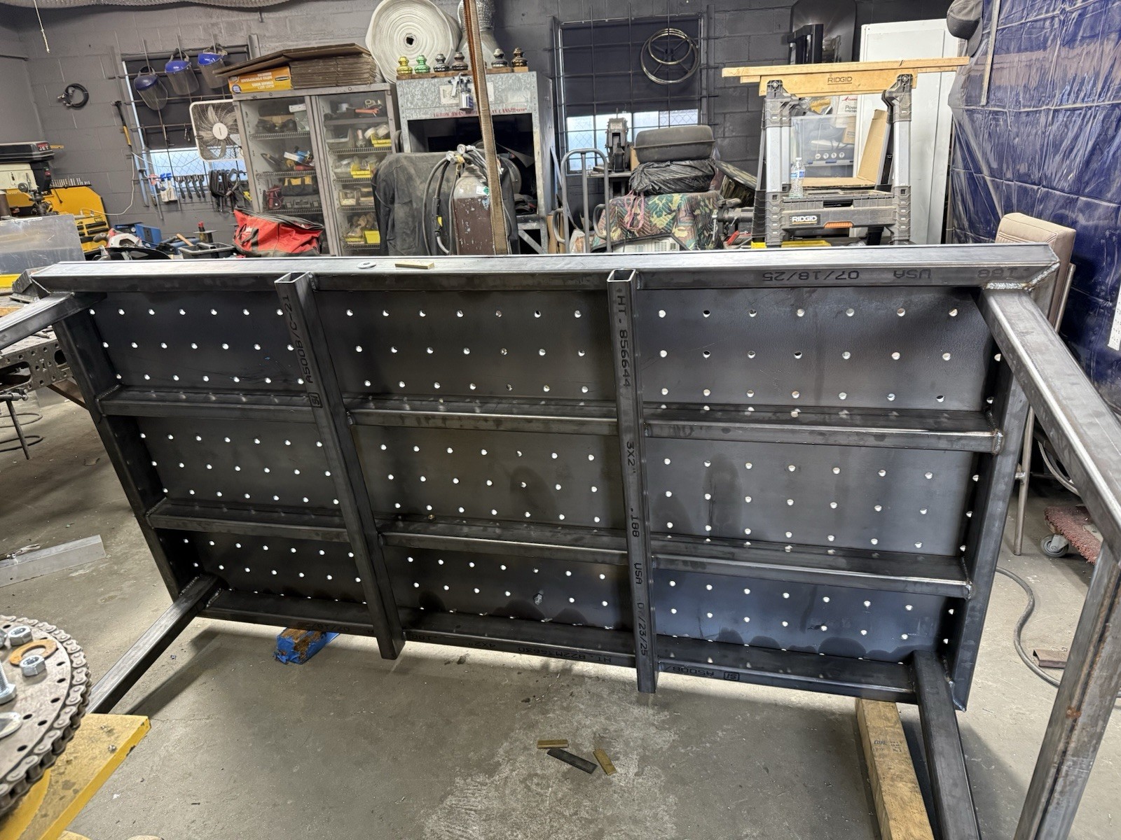 Heavy-Duty Steel Welding Table with Perforated Top for Professional Metalworking
