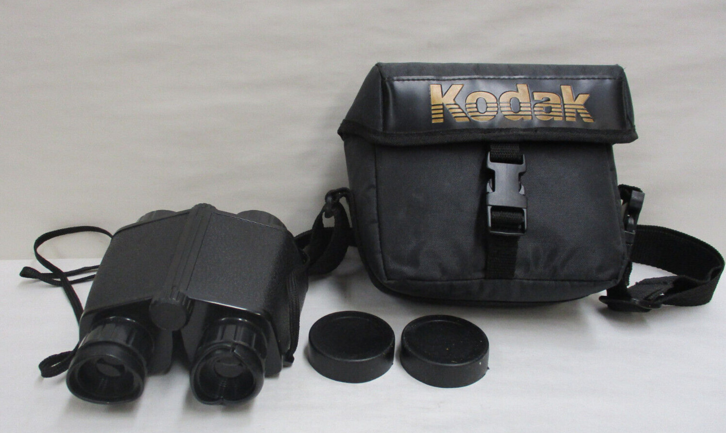 Unbranded Black Plastic Field Binoculars with Kodak Carrying Case